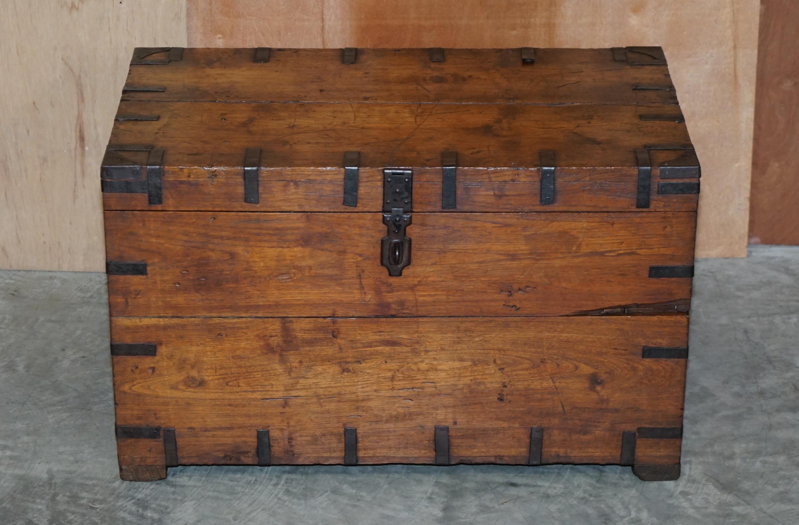We are delighted to offer for sale this lovely hand made in England circa 1900 oak & wrought iron bounded steamer travel trunk with zinc lining 

A very decorative and versatile trunk, ideally suited as a coffee table but can of course be used for