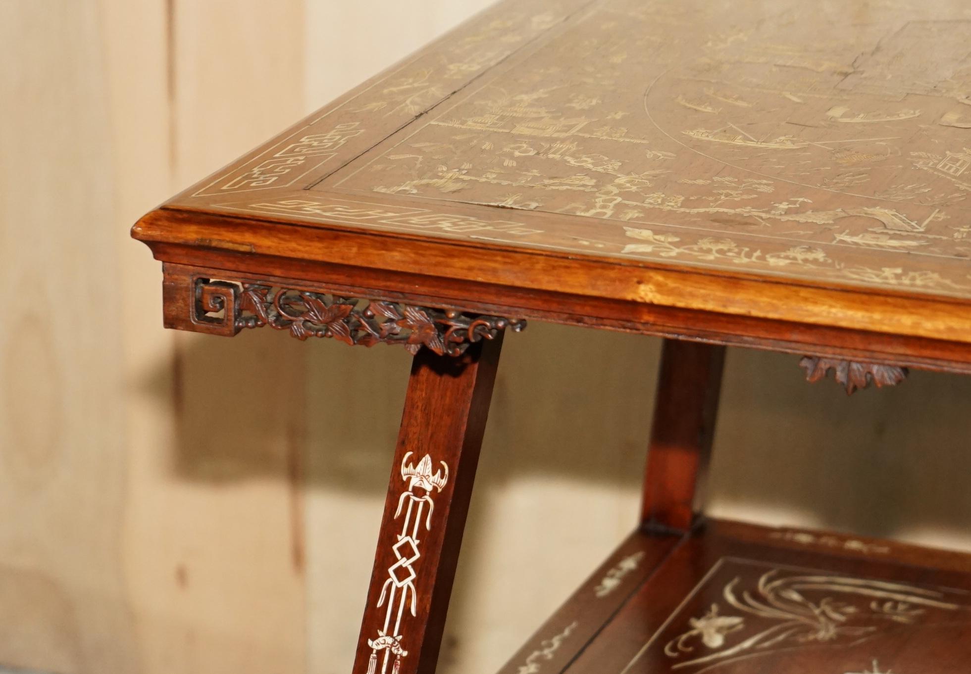 Chinese ANTIQUE CIRCA 1900 ORNATELY CARVED AND HEAViLY INLAID CHINESE OCCASIONAL TABLE For Sale