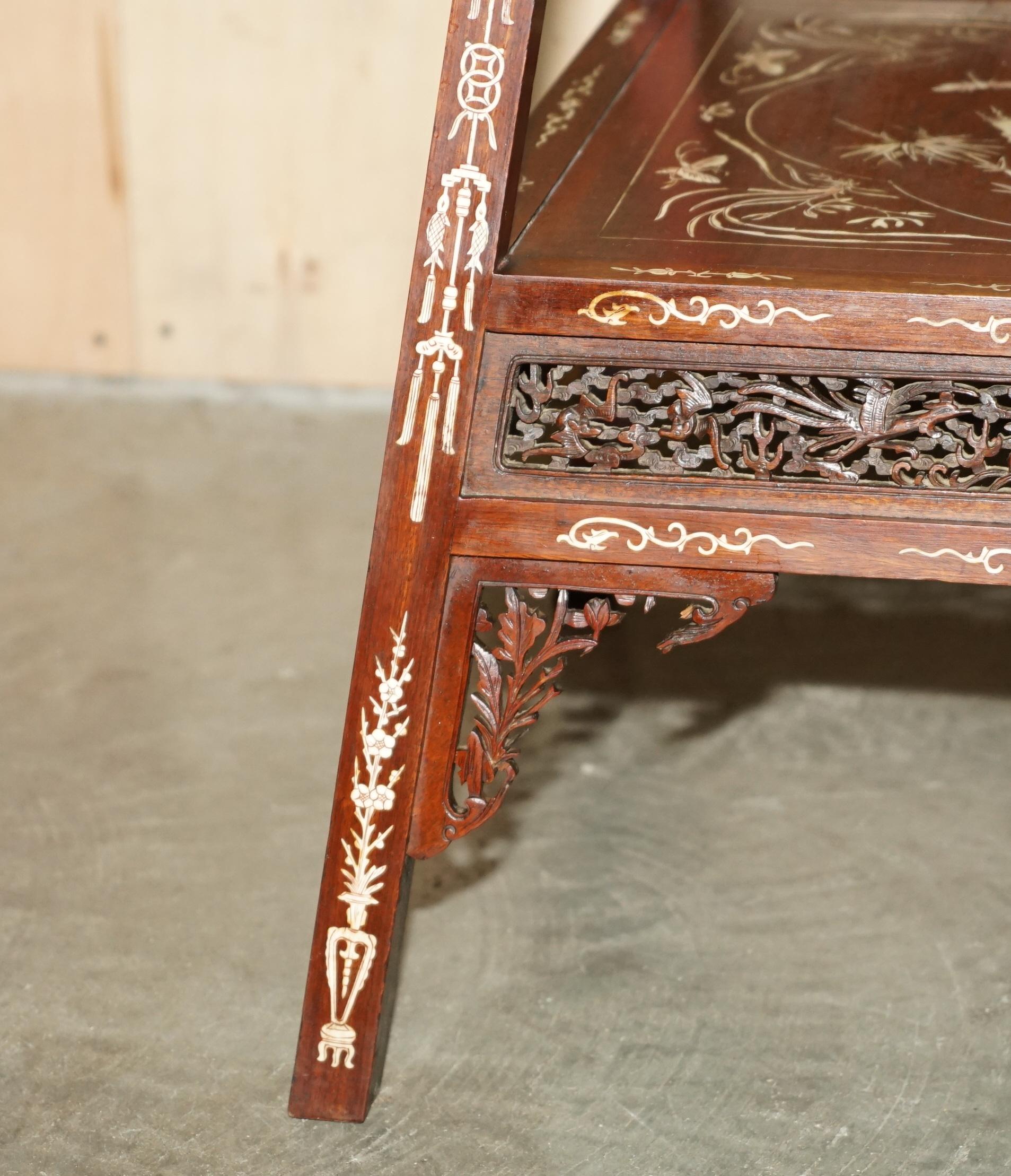 Hand-Crafted ANTIQUE CIRCA 1900 ORNATELY CARVED AND HEAViLY INLAID CHINESE OCCASIONAL TABLE For Sale