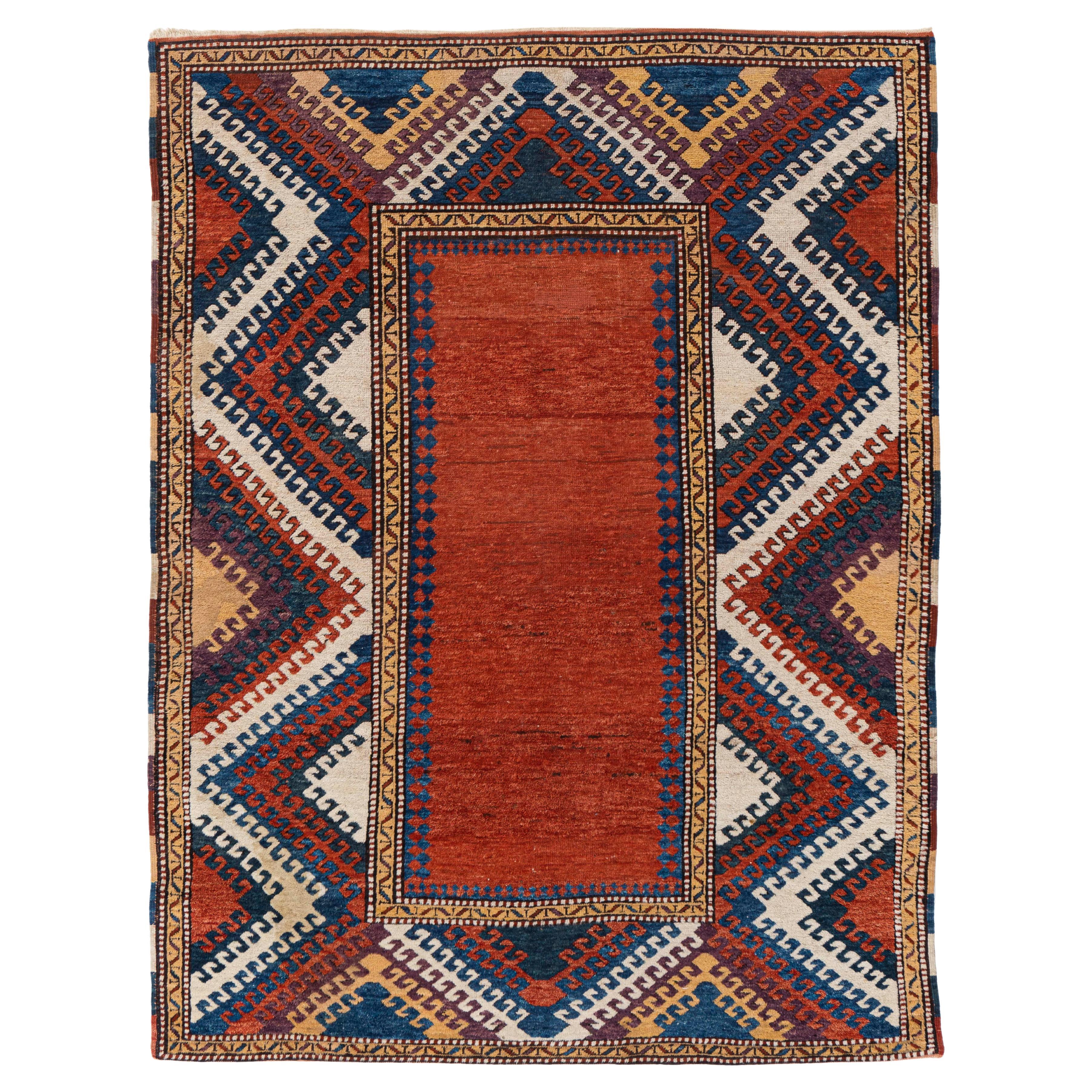 Antiker roter kaukasischer Kazak-Handgeknüpfter Teppich, um 1900 im Angebot