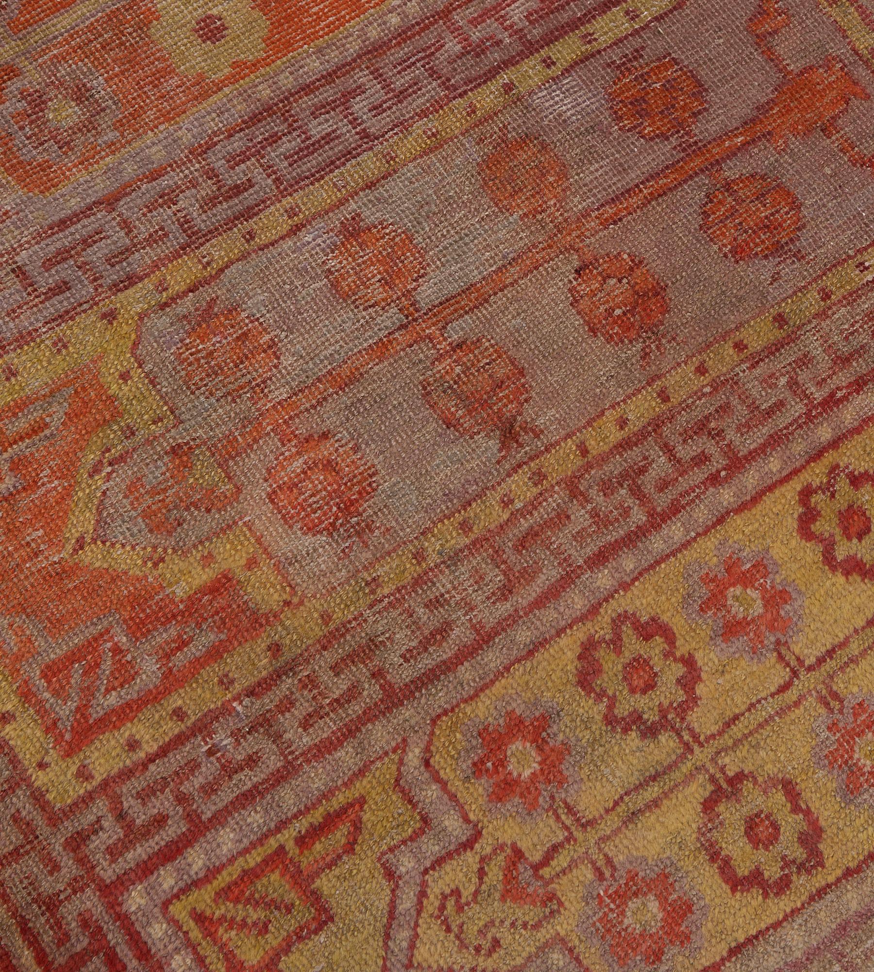 Turkestan orientale Antico Runner Khotan a pannelli in lana rossa e gialla del 1800 circa in vendita