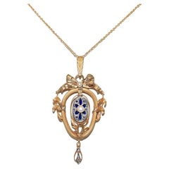 Collana antica del 1900 in oro 18k con smalto e perle, decorata con un fiocco