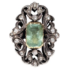 Bague ancienne datant des années 1900, or 18 carats, argent, diamant naturel et émeraude