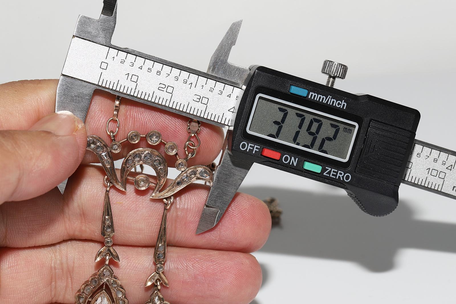 Collier pendentif ancien des années 1900 en or 9 carats décoré de diamants naturels taille rose en vente 11