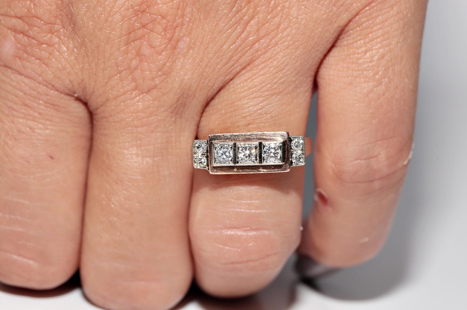 Ancienne bague artisanale des années 1900 en or 14 carats décorée de diamants naturels en vente 9