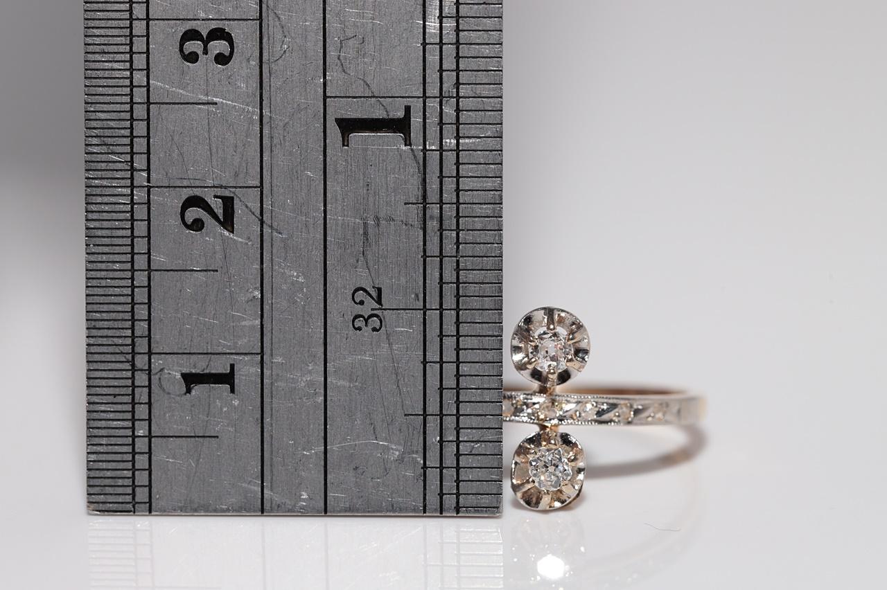 Ancienne bague artisanale des années 1900 en or 18 carats décorée de diamants naturels en vente 5