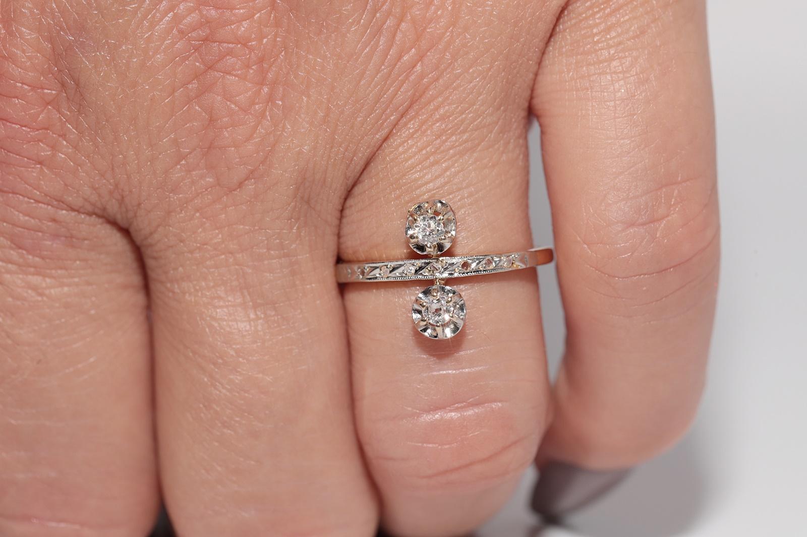 Ancienne bague artisanale des années 1900 en or 18 carats décorée de diamants naturels en vente 10