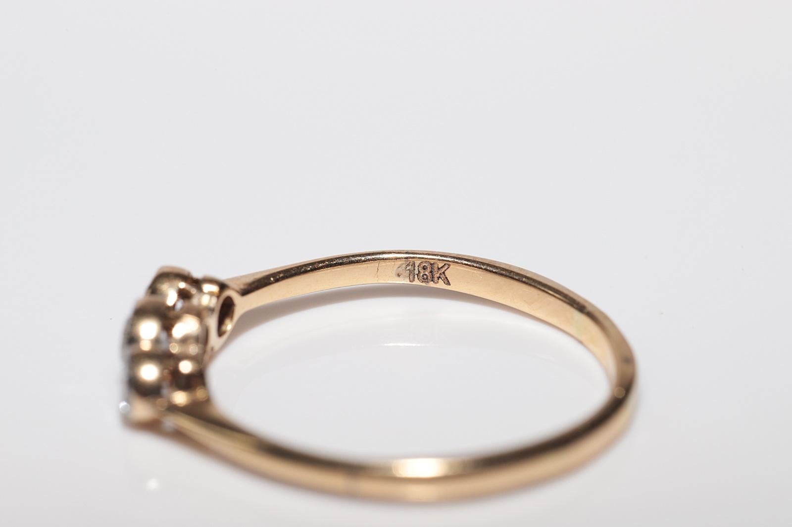 Bague ancienne des années 1900, fabriquée à la main en or 18 carats, décorée de trois diamants naturels en vente 11