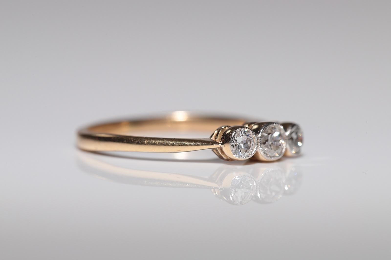 Bague ancienne des années 1900, fabriquée à la main en or 18 carats, décorée de trois diamants naturels Bon état - En vente à Fatih/İstanbul, 34