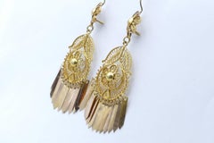 Antique, circa 1910, 17 Carat Yellow Gold Fancy Cut Tassel Drop Earrings