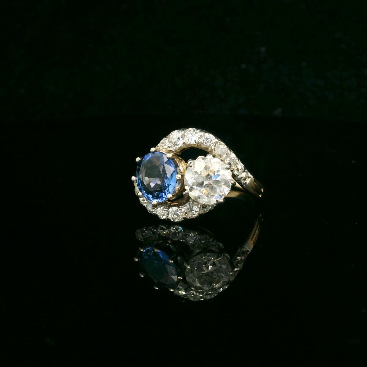 Toi et Moi ( You and Me) antique ring. 

The ring is made of bicolore gold 18 karat ( yellow for the body of the ring and white for the top of the ring). 

The ring is set with an old European diamond of approximately 1.05 Carats ( Estimated G color