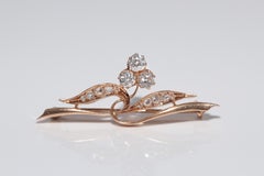 Broche ancienne artisanale des années 1910 en or 14 carats avec diamants naturels