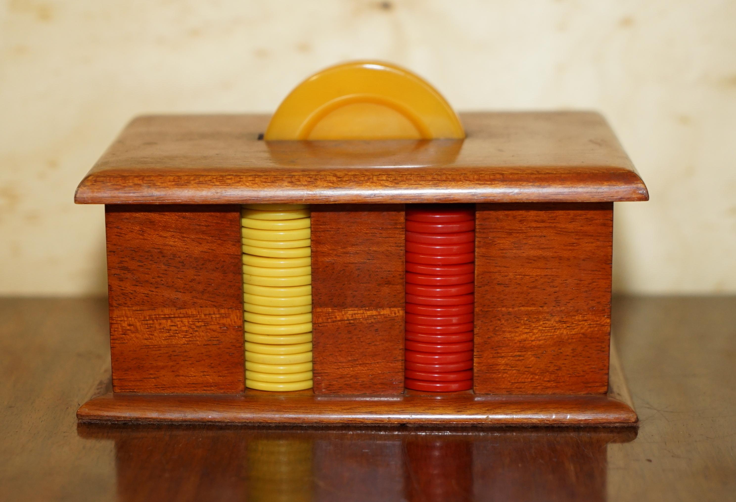 Royal House Antiques

Royal House Antiques is delighted to offer for sale this very nice circa 1920 Art Deco casino chip / poker set in the original wood case with Bakelite handle

A very decorative and cool suite, very much of the period and adds a
