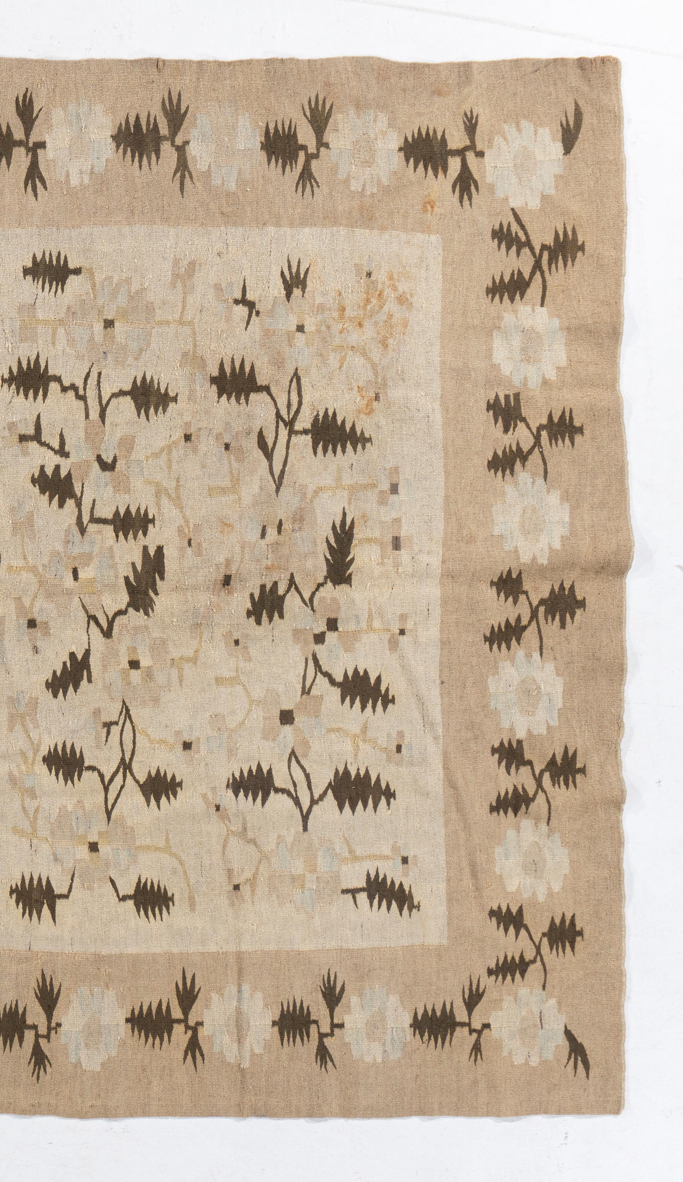5'7 X 8'11. The antique and vintage carpets of Bessarabia are almost all flatwoven with profuse, semi-French patterns, and woven in southern Russia, originally for an affluent domestic market. Designs of floral bouquets and vases, often on desirable