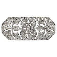 Broche ancienne Art déco des années 1930 en or 14 carats décorée de diamants naturels