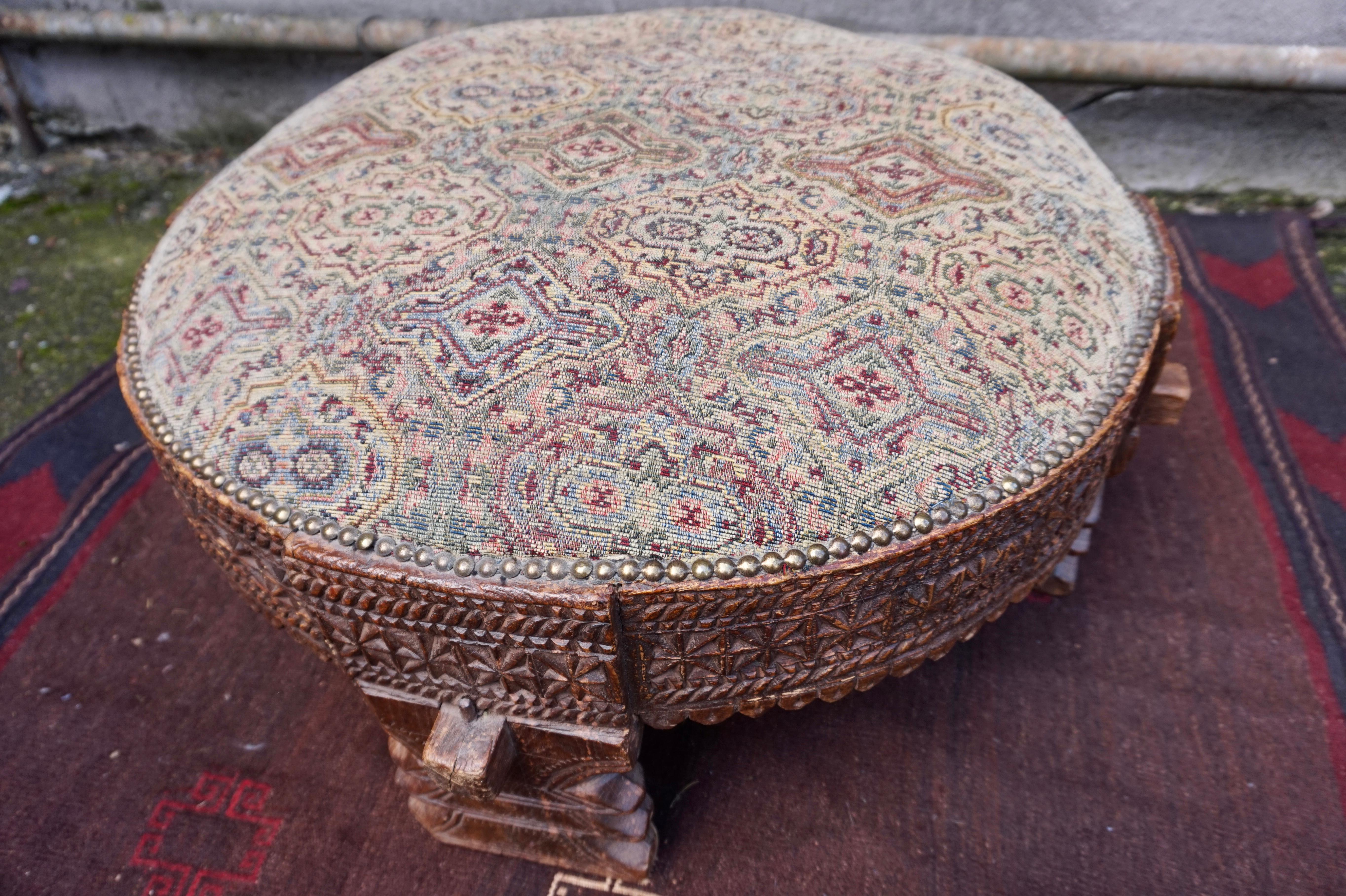 Folk Art Antique Circular Hand Carved Indonesian Padouk Wood Ottoman Seat For Sale