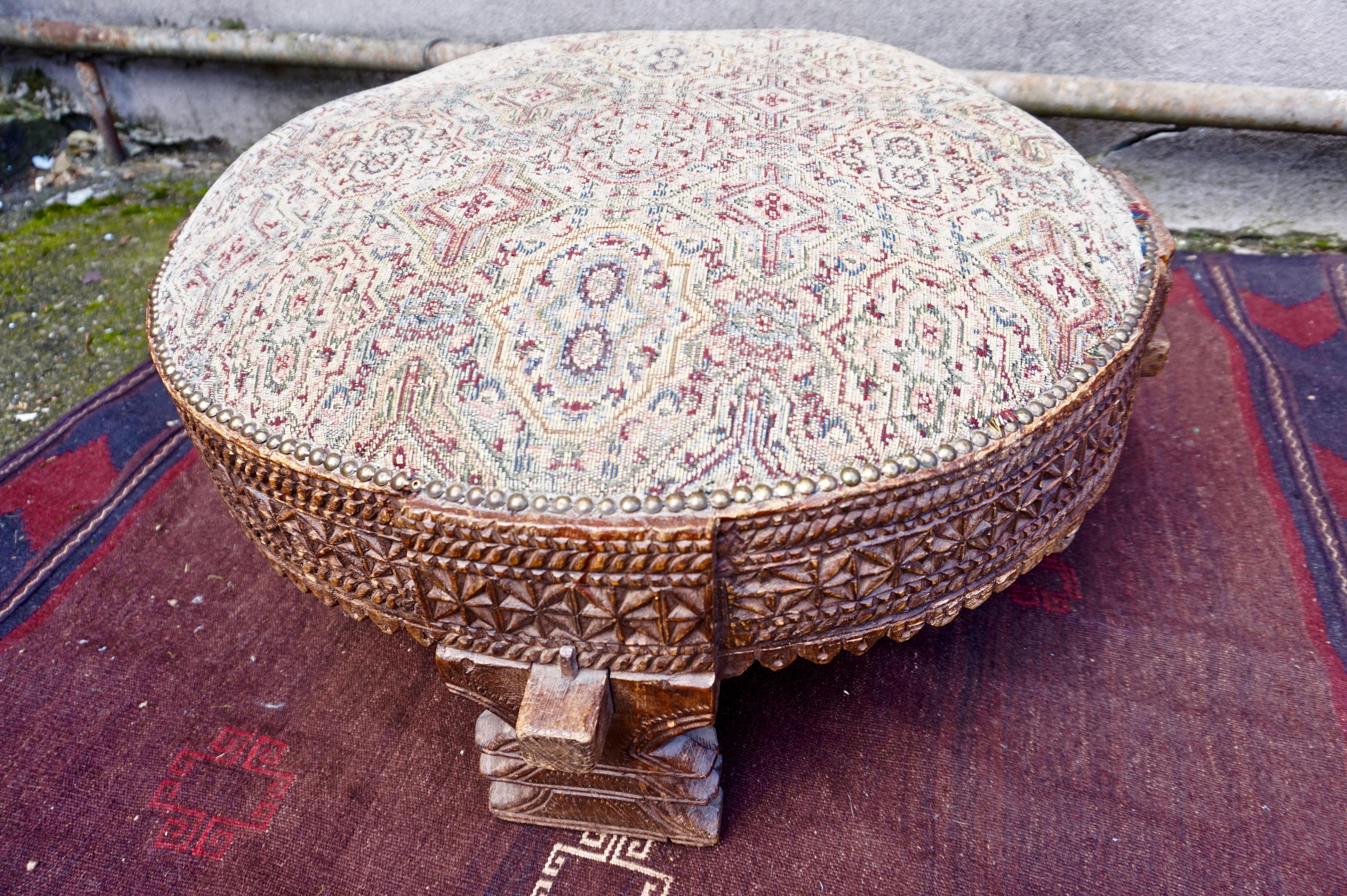 Early 20th Century Antique Circular Hand Carved Indonesian Padouk Wood Ottoman Seat For Sale
