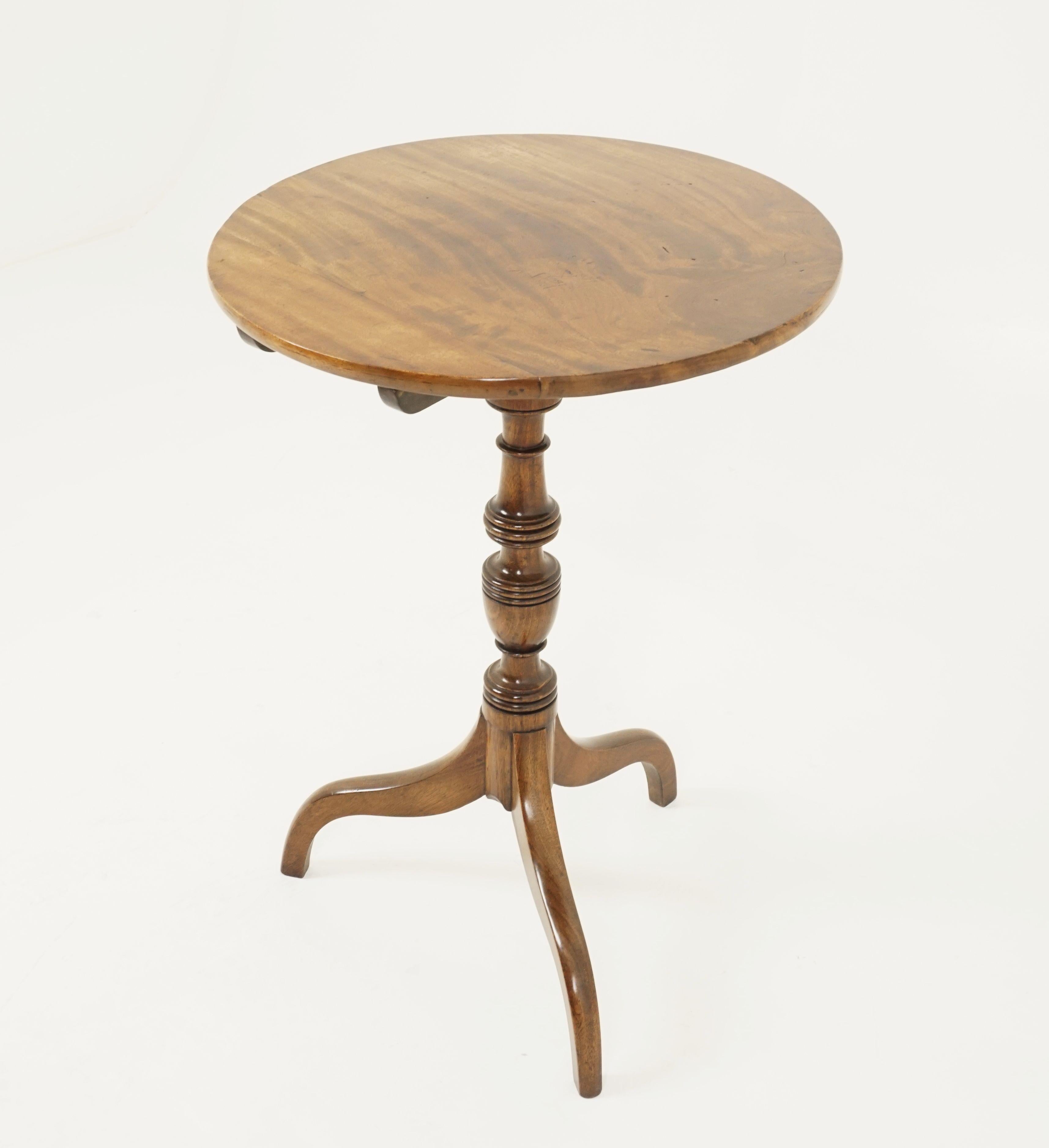 Antique circular walnut table, victorian tilt top table, Scotland 1860

Scotland 1860
Solid walnut
Original finish
Circular top having been made from one complete piece of walnut
Supported by a central turned ring pillar
Above a tripod