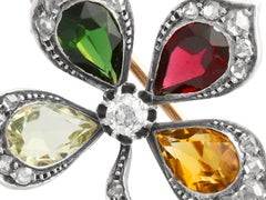Antique Citrine Tourmaline Garnet and 0.67 Carat Diamond Floral Brooch