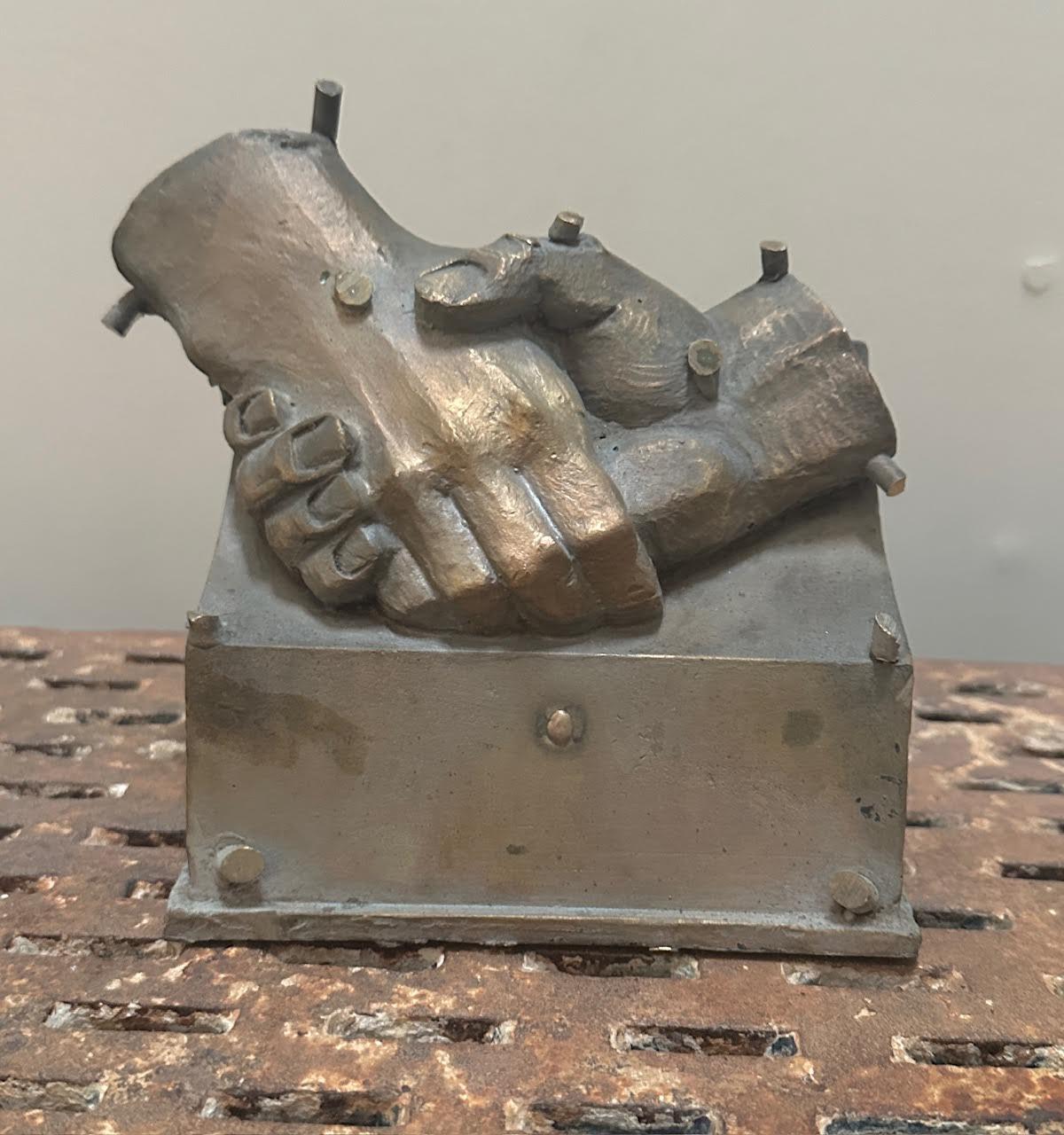antique brass or bronze mold for making a set of clasped or shaking hands. Most likely fraternal. Fine detail work. No cracks or breaks. Untouched surface.
Free shipping in the continental US. 