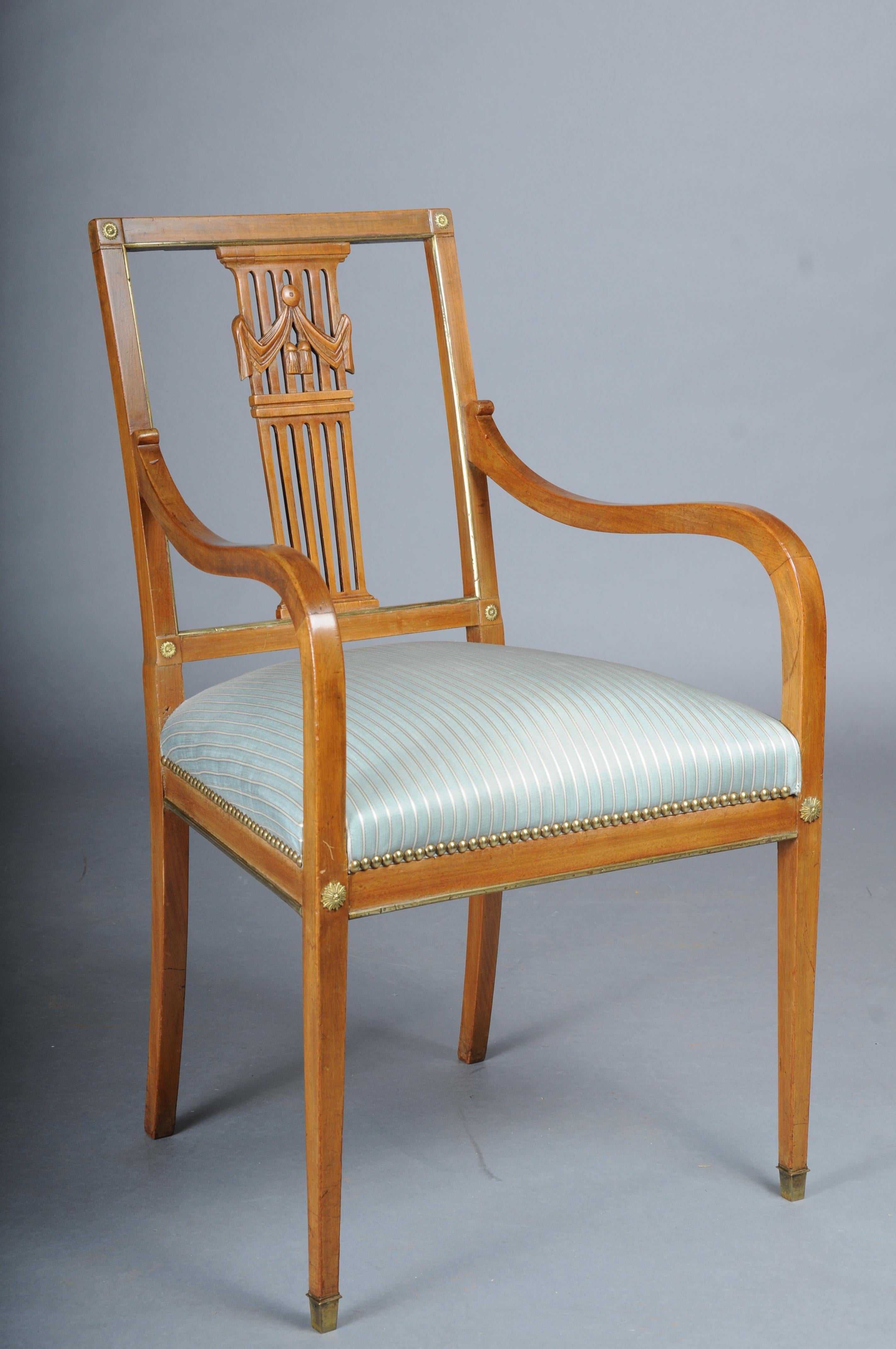 Antique classic Empire armchair mahogany with brass, Paris.

Solid mahogany. In the middle with carved latticework and Empire garland.

The armchair has brass applications in the Empire style distributed over the entire body.

Classic seat