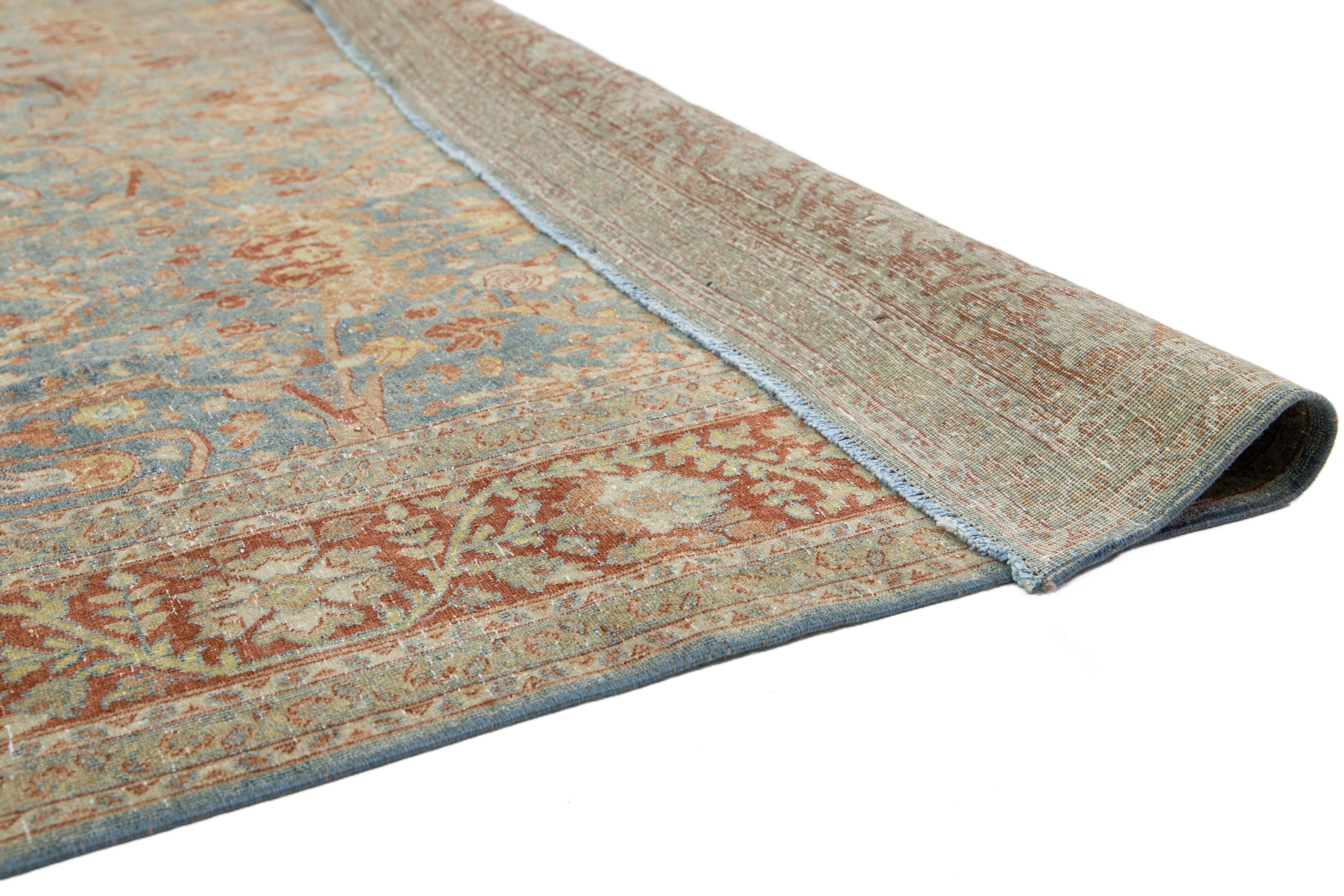 Antiker klassischer persischer Wollteppich aus Täbris in Blau mit floralem Muster (Persisch) im Angebot