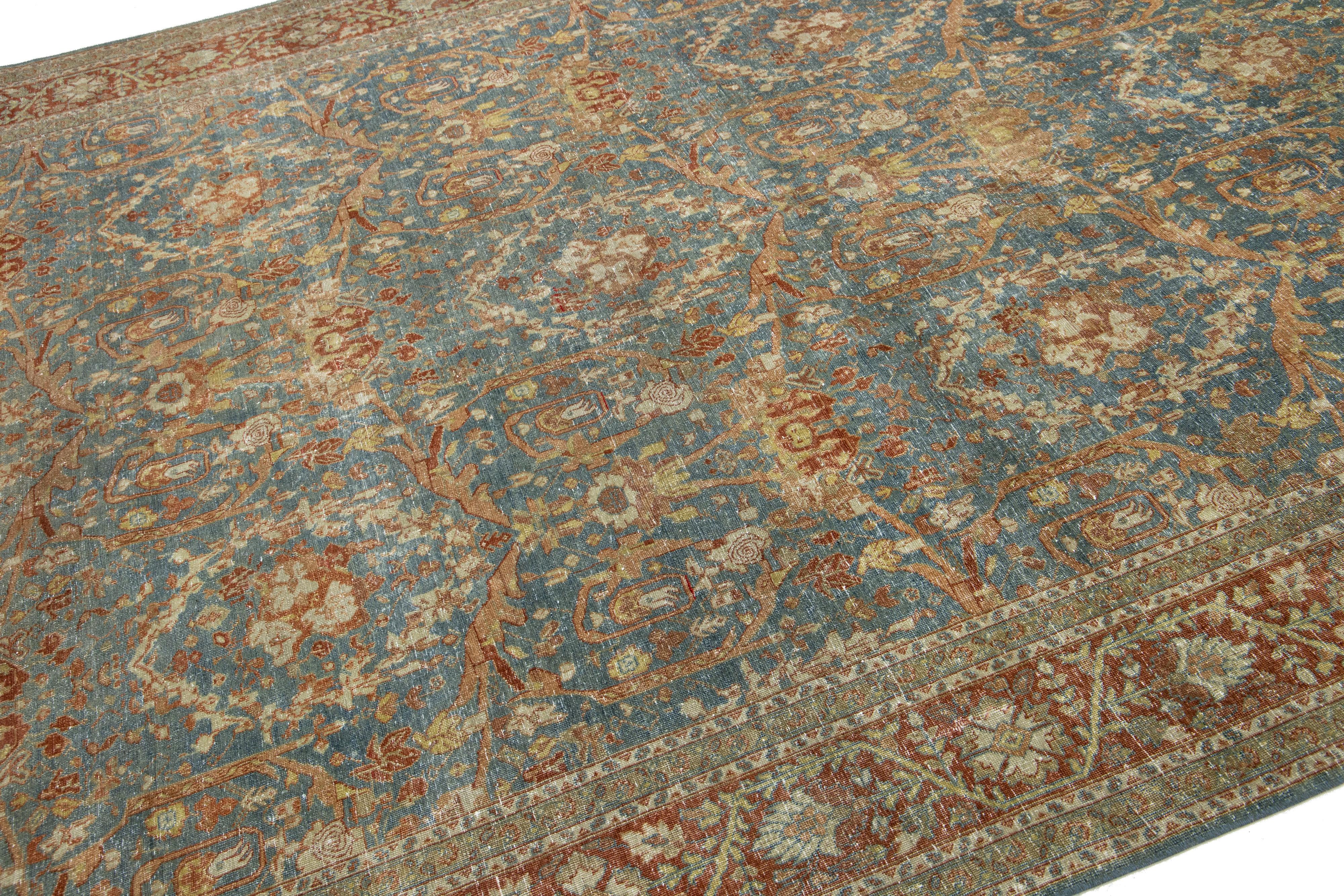 Antiker klassischer persischer Wollteppich aus Täbris in Blau mit floralem Muster (Handgeknüpft) im Angebot