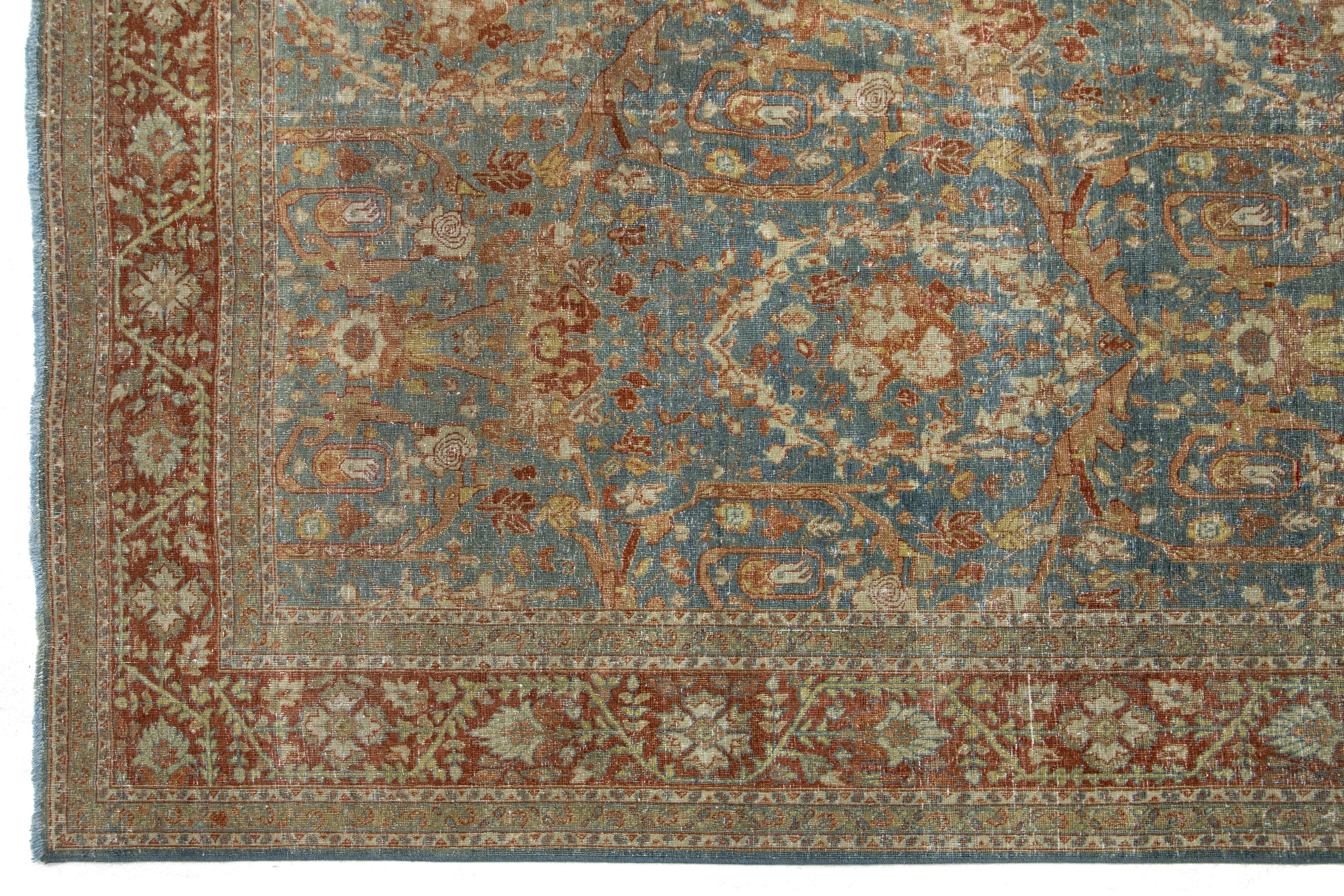 Antiker klassischer persischer Wollteppich aus Täbris in Blau mit floralem Muster (20. Jahrhundert) im Angebot