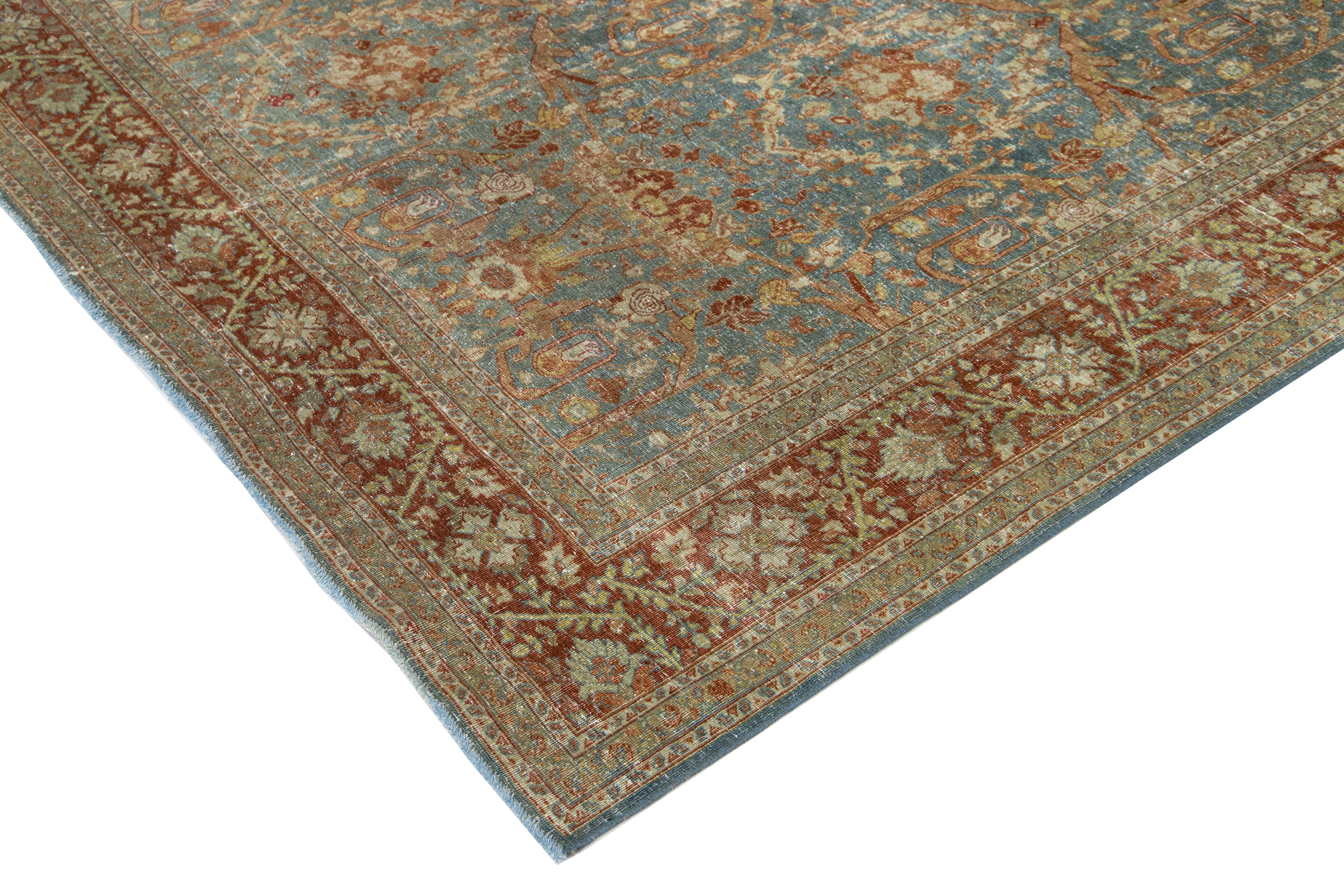 Antiker klassischer persischer Wollteppich aus Täbris in Blau mit floralem Muster (Wolle) im Angebot