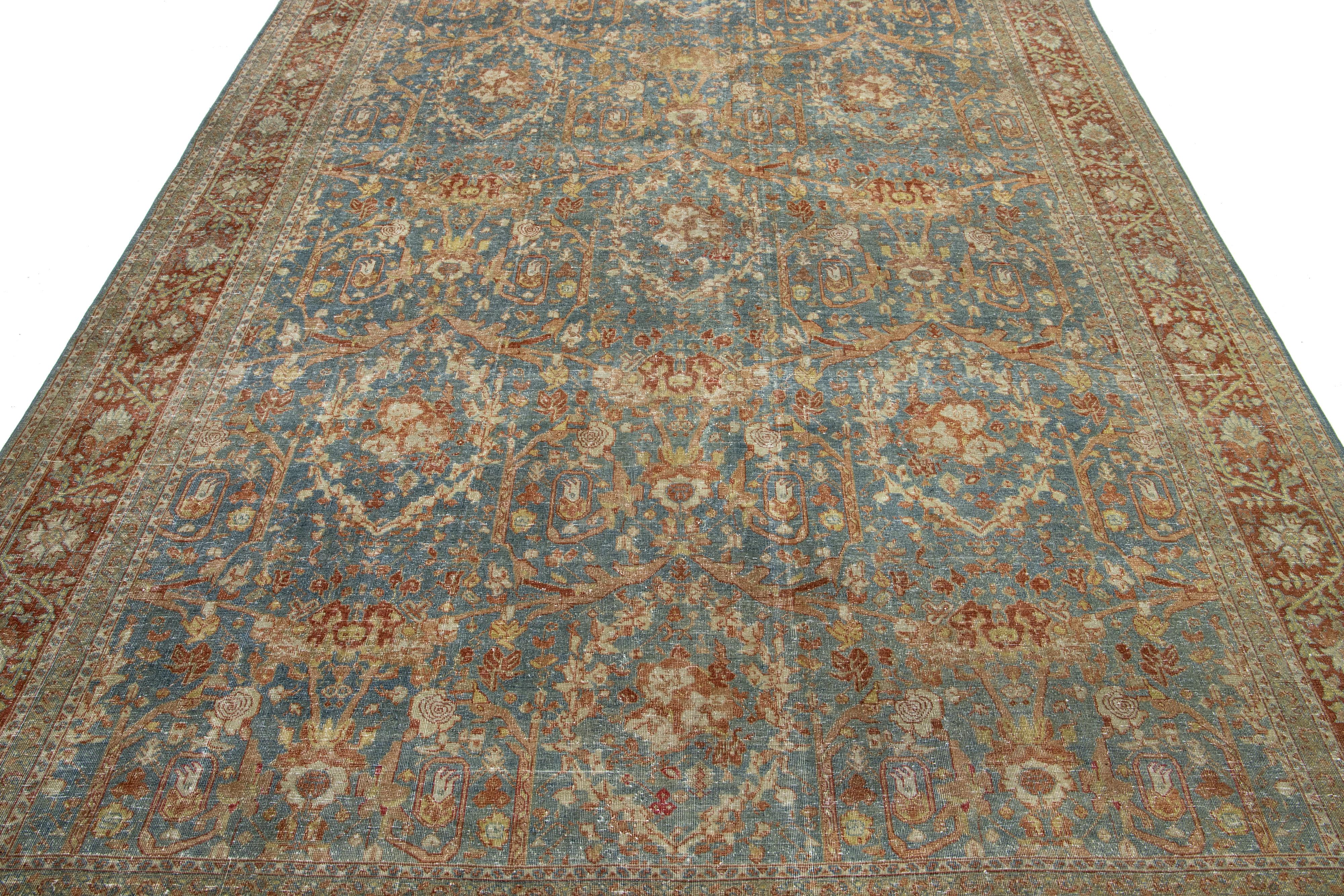 Antiker klassischer persischer Wollteppich aus Täbris in Blau mit floralem Muster im Angebot 1