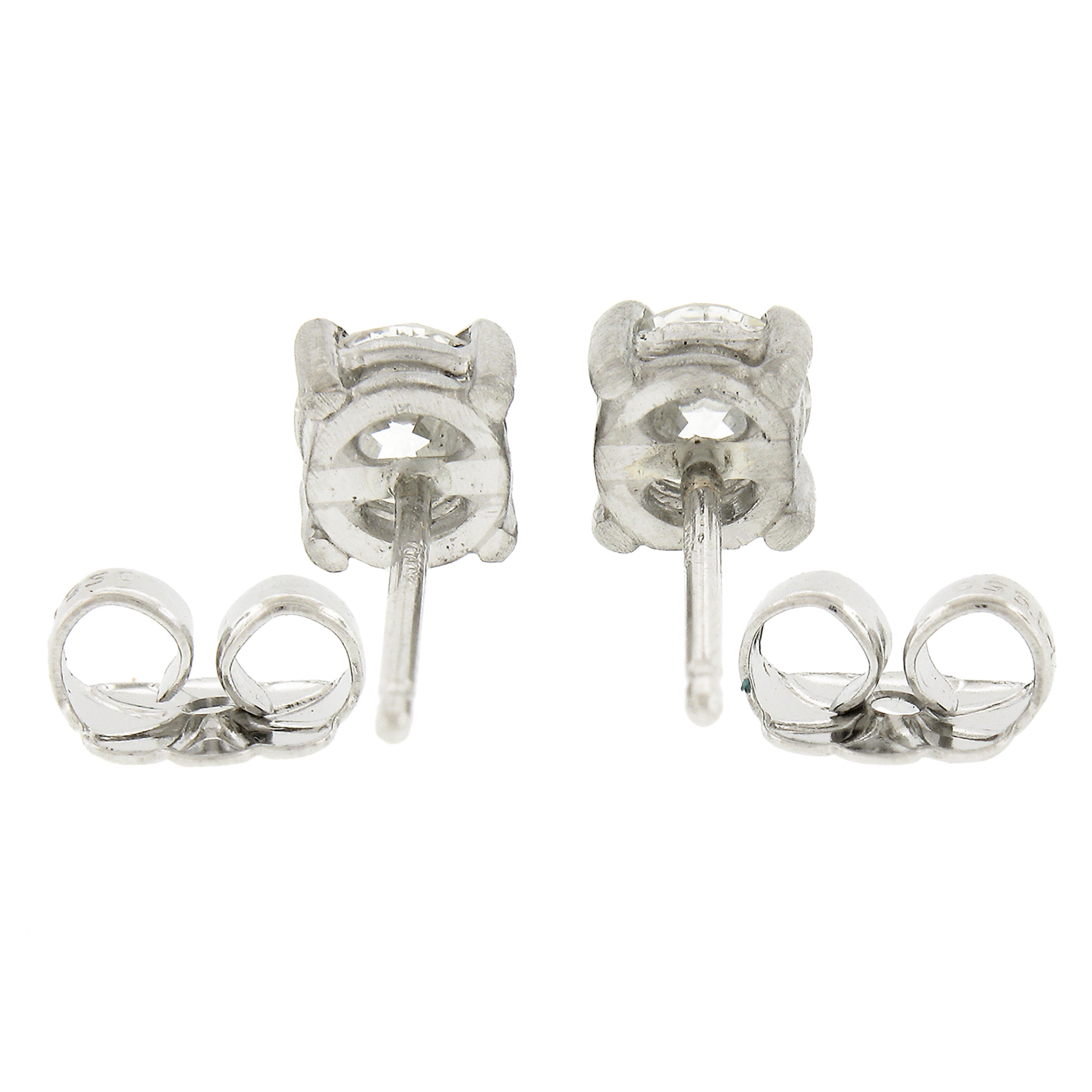 --Stone(s):--
(2) Natural Genuine Diamonds - Old European Cut - Prong Set - H/I Color - VS2 Clarity
Total Carat Weight:	0.76 (exact)

Material: Solid Platinum
Weight: 1.75 Grams
Backing:	Post Backs w/ Sturdy Butterfly Closures (Pierced ears are