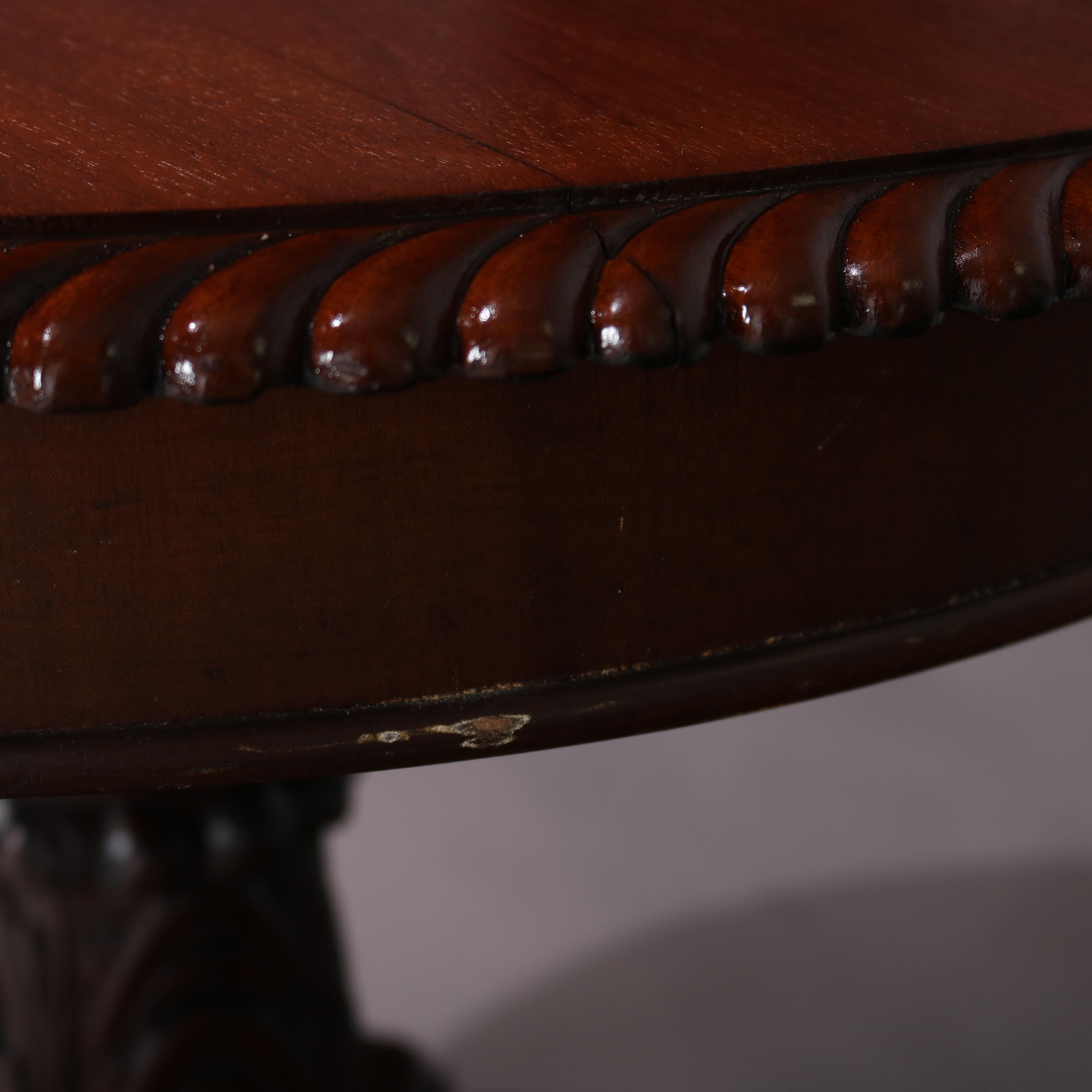 Classical American Empire Carved Mahogany Paw Foot Center Table, circa 1850 7