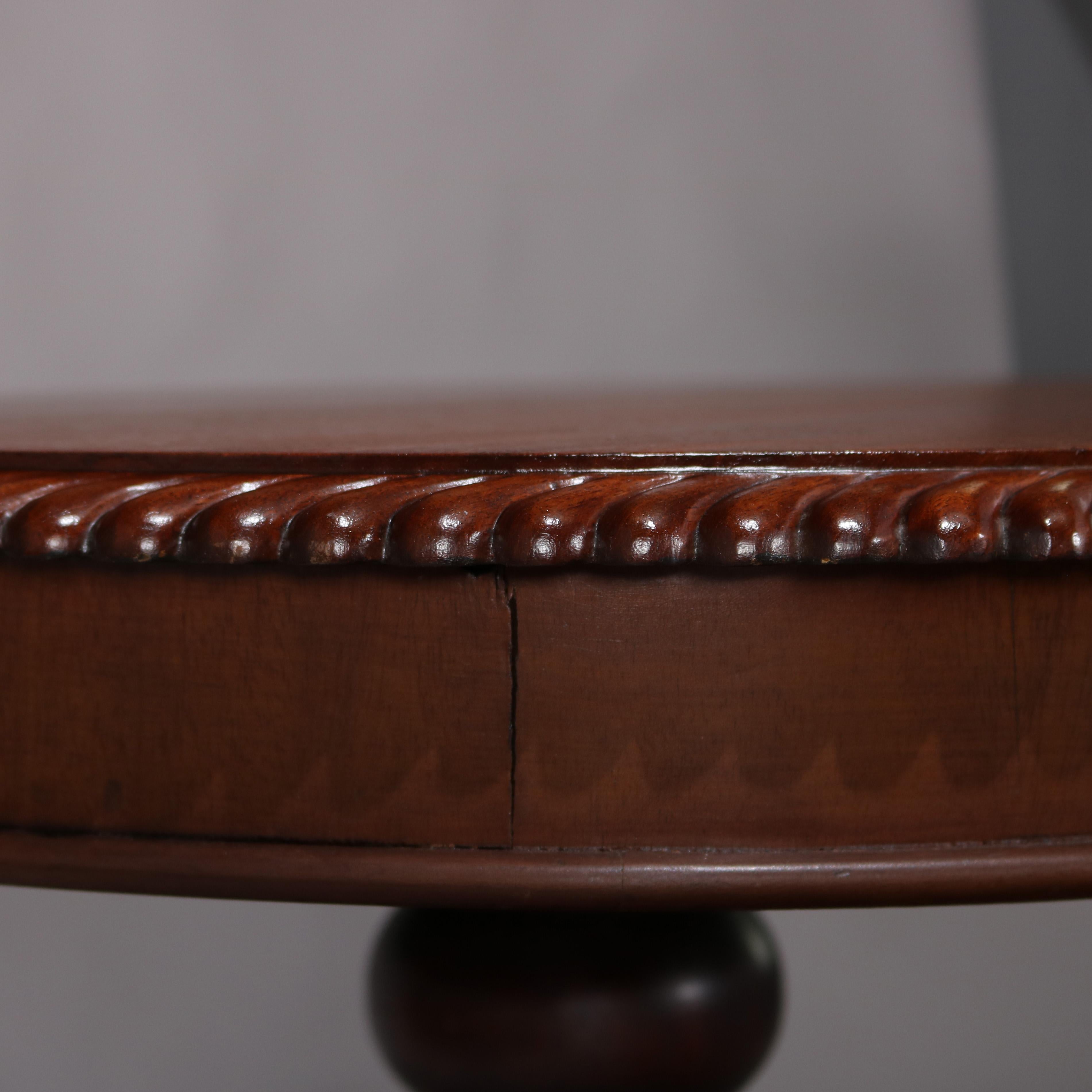 Classical American Empire Carved Mahogany Paw Foot Center Table, circa 1850 1