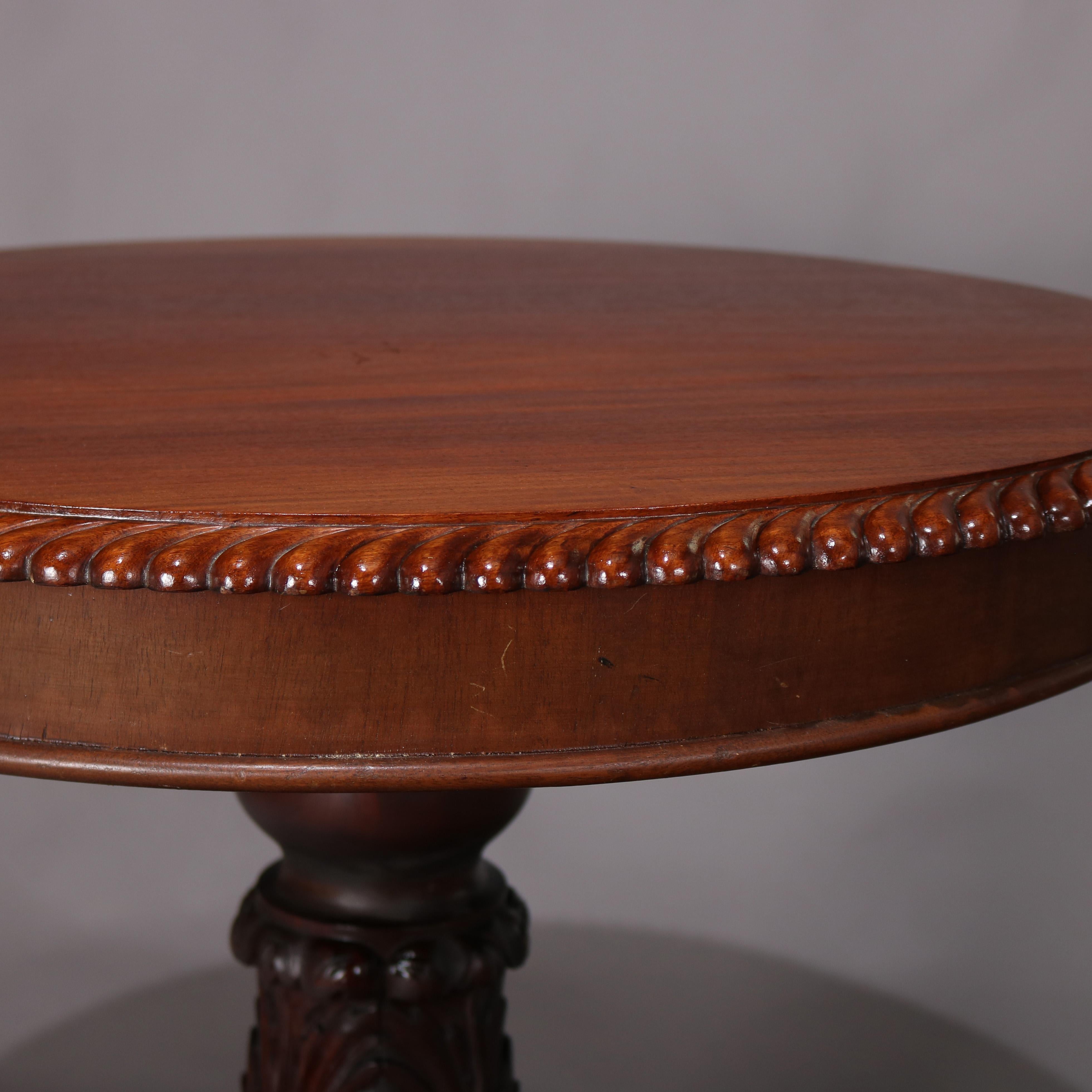 Classical American Empire Carved Mahogany Paw Foot Center Table, circa 1850 4
