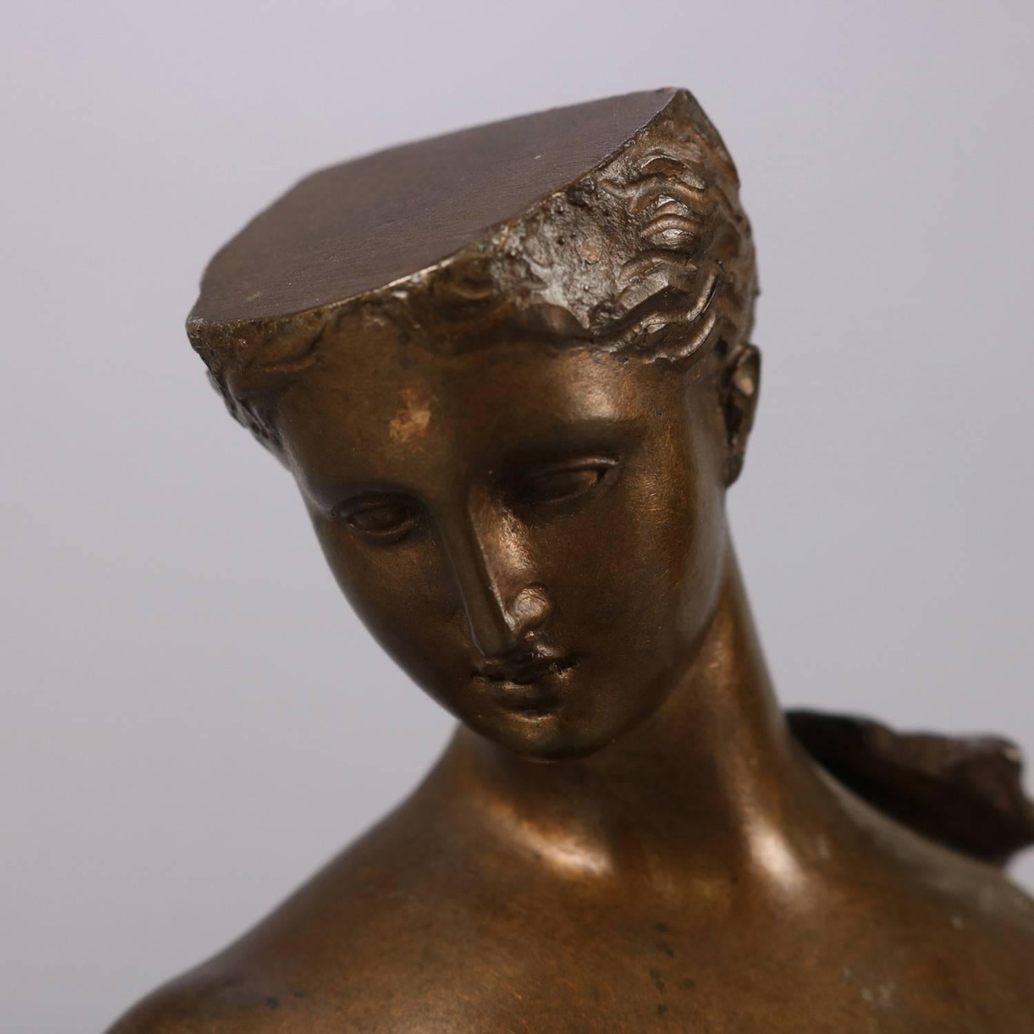 Antique bronzed unfinished 3/4 sculpture portrait of partial nude Classical woman on marble base, dated 1890.

Measures: 7.75