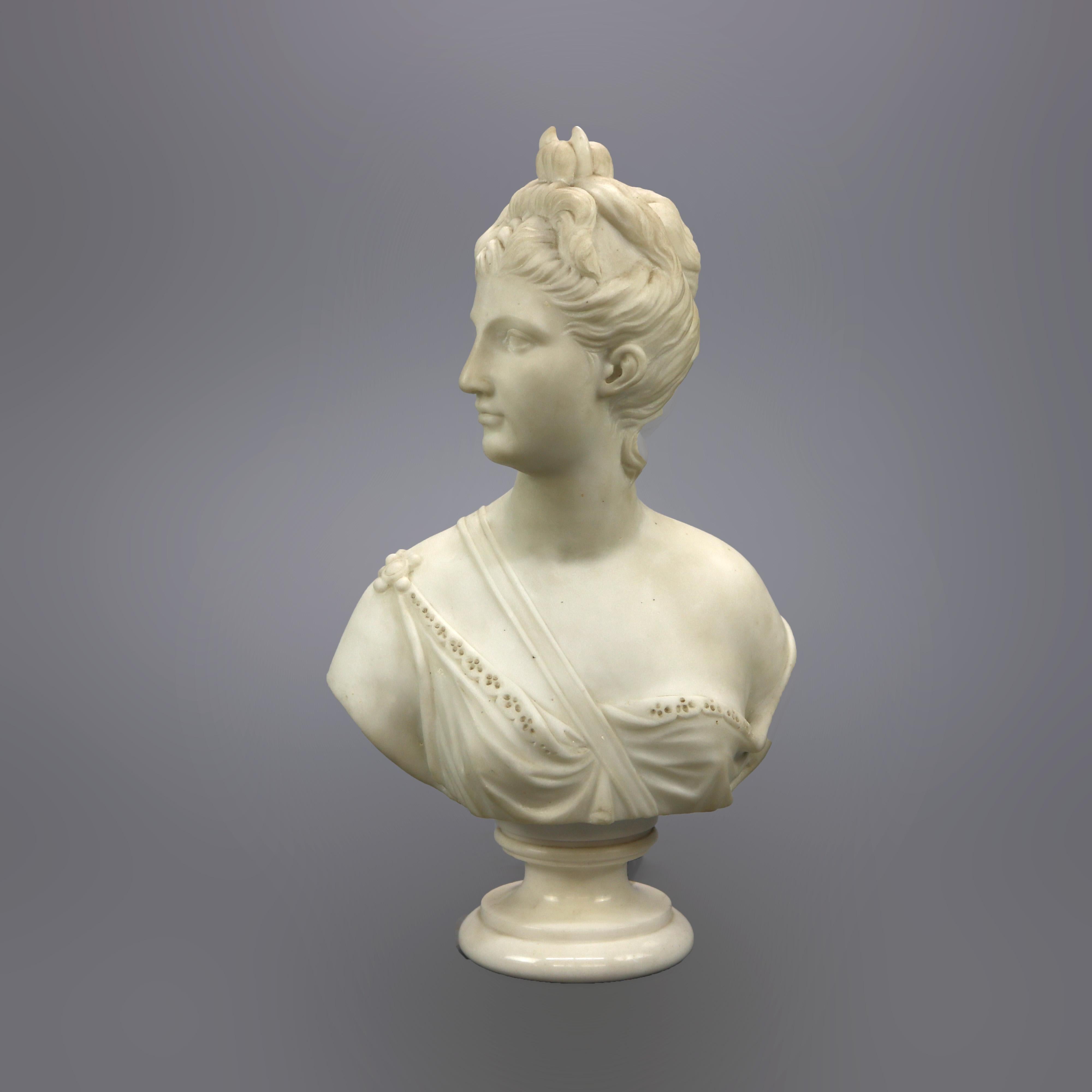 An antique Classical sculpture offers carved alabaster bust of the Roman Diana the Huntress raised on a stepped plinth, c1890

Measures - 17.75''H x 10''W x 5.5''D.