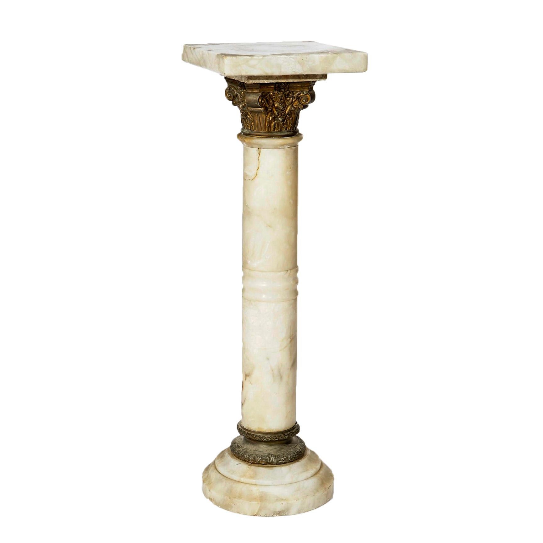 An antique Classical Greco-Roman sculpture pedestal offers marble construction in Corinthian form with square display over banded column having cast bronze mounts and raised on circular stepped base, circa 1890

Measures- 37''H x 11.5''W x 11.5''D.