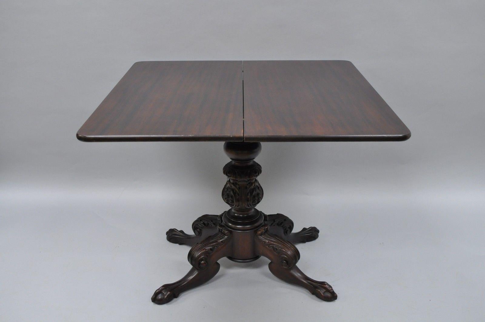 antique game table with claw feet