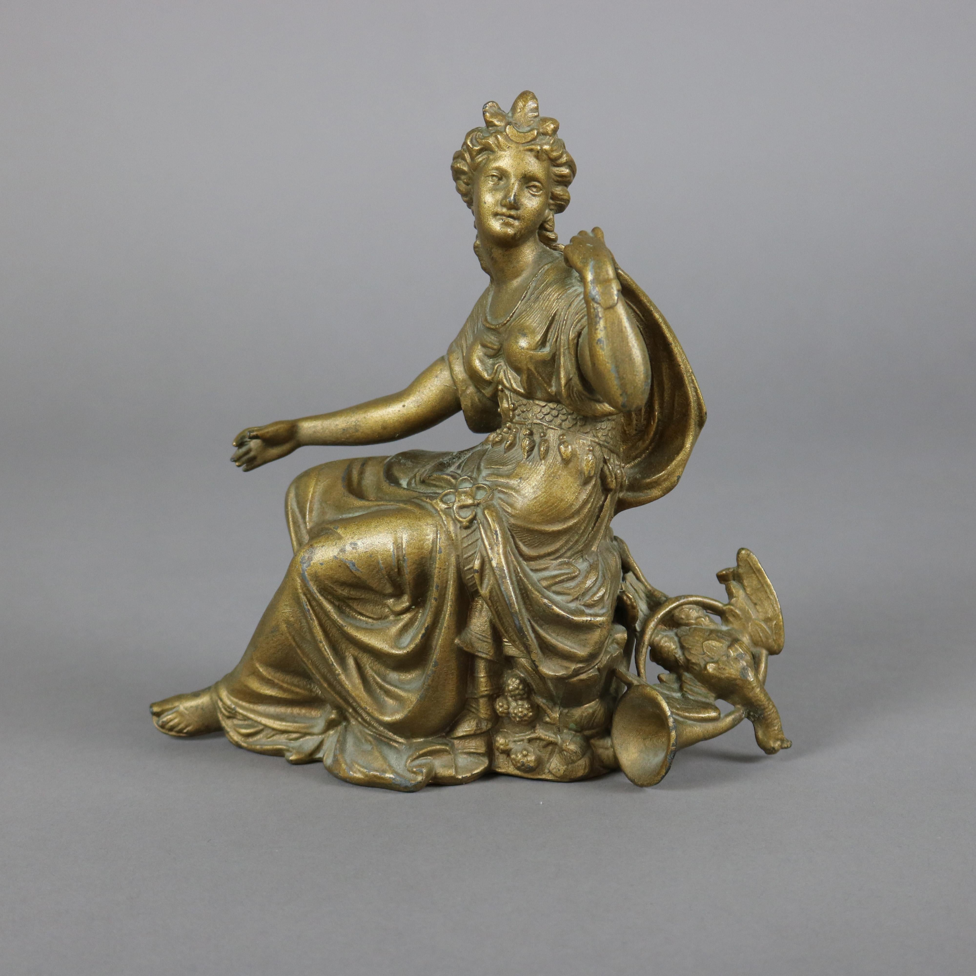 An antique Classical portrait sculpture offers gilt cast metal figure of a Grecian woman with horn and pheasant, c1890

Measures - 8.5''H x 8.25''W x 3.5''D.

Catalogue Note: Ask about DISCOUNTED DELIVERY RATES available to most regions within 1,500