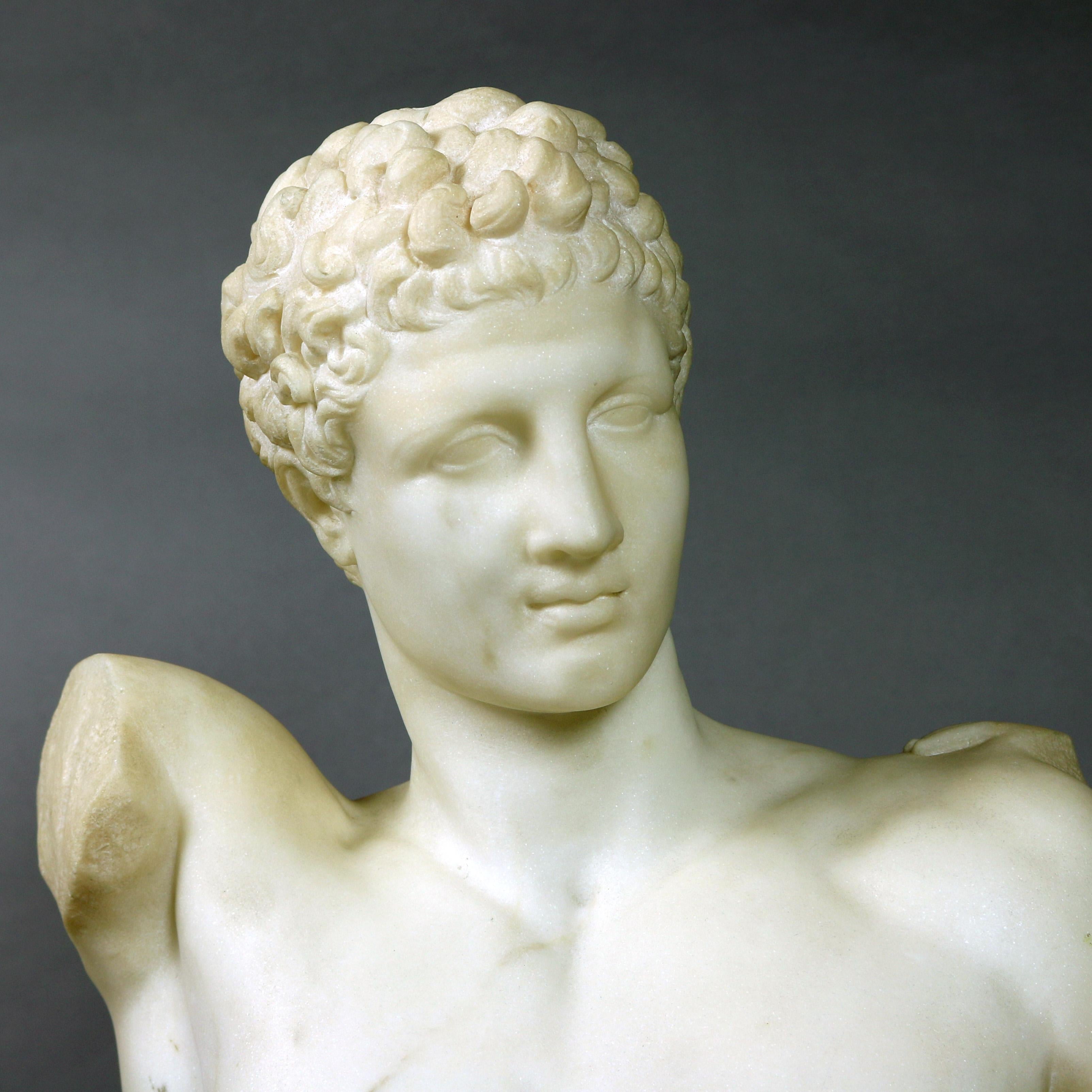 An antique Classical Italian carved marble portrait bust of Greek God Hermes after original by Praxiteles, seated on stepped plinth, 19th century

Measures: 20.25
