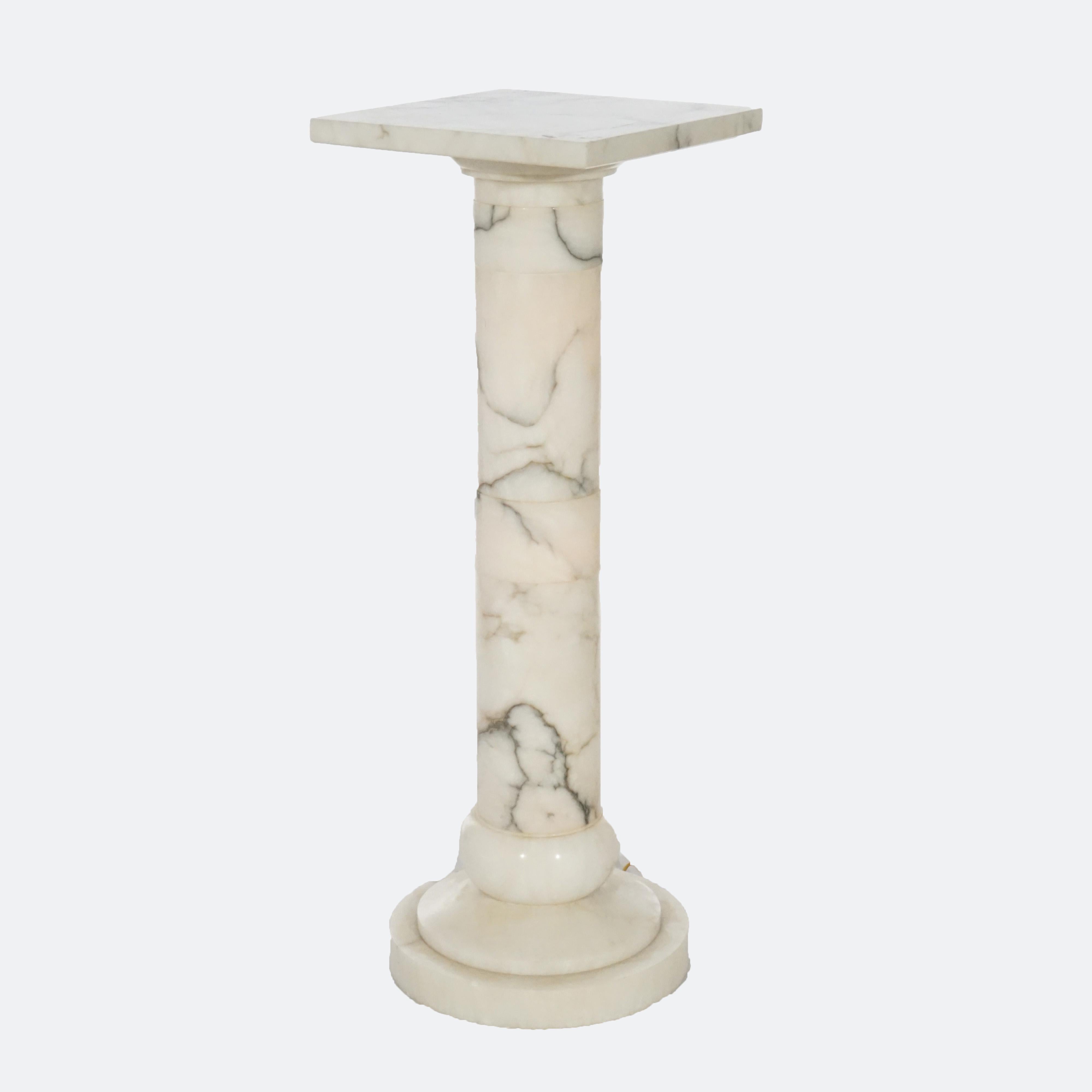 An antique Greek Classical sculpture pedestal offers marble construction in Doric column form with square display over lighted column, c1890

Measures- 33''H x 11.5''W x 11.5''D

*Ask about DISCOUNTED DELIVERY rates within 1,500 miles of NY*