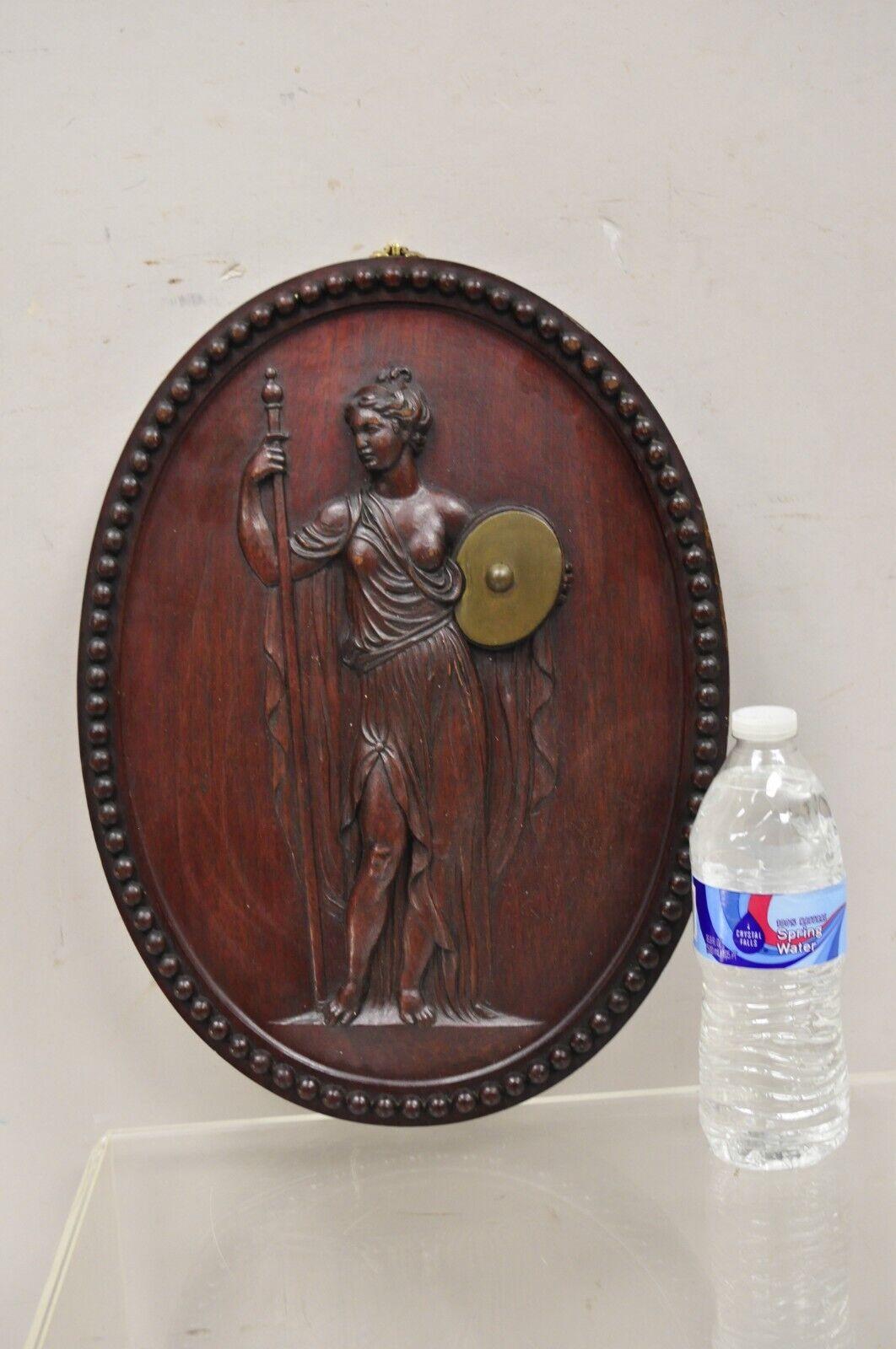 Antique Classical Oval Relief Carved Mahogany Figural Goddess Wall Sculpture Plaque. Circa Early 1900s. Measurements: 16