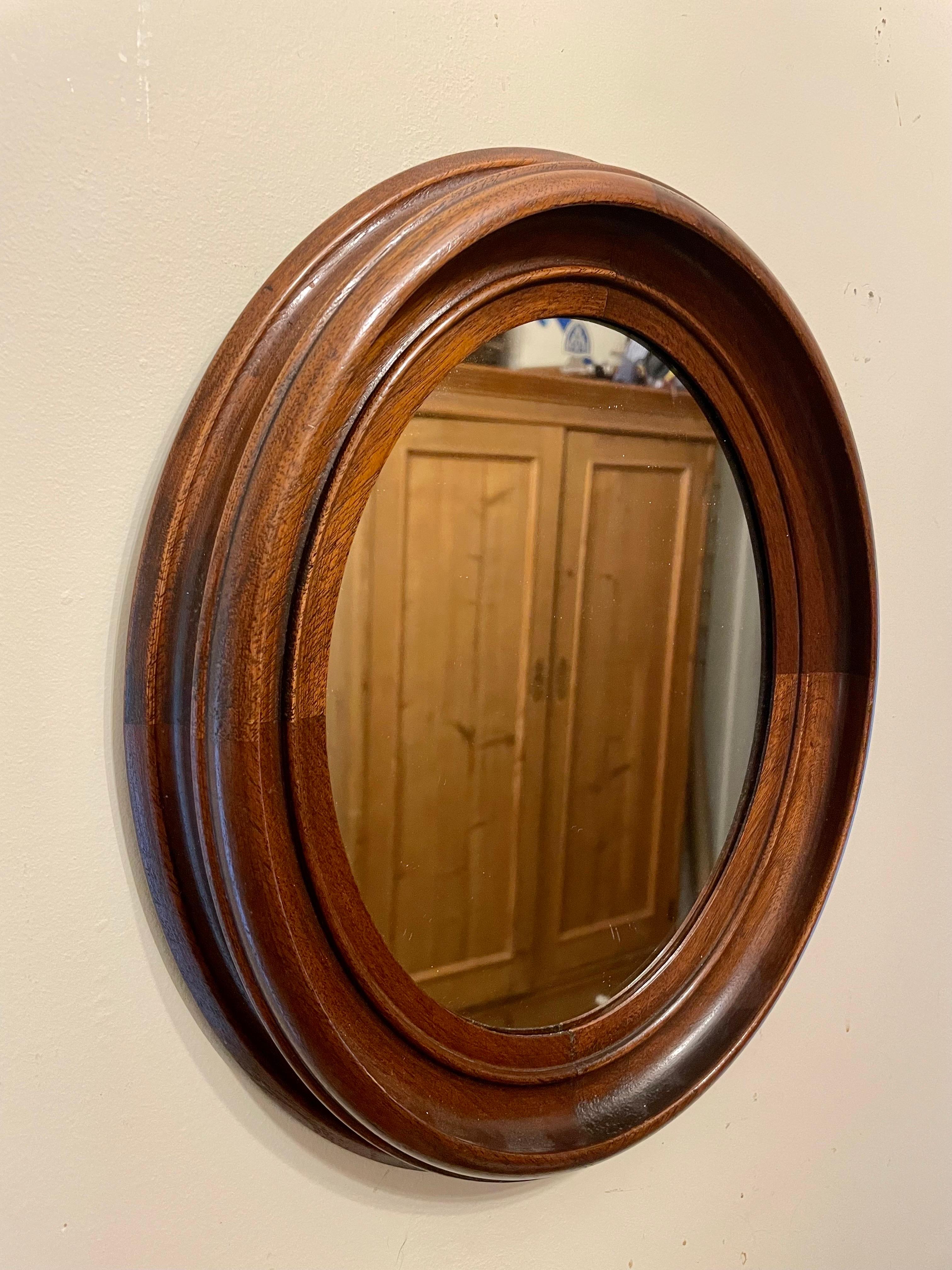 Nice Antique Oval Solid Walnut Classical Deep Frame Mirror, a stunning piece that combines timeless elegance with rich craftsmanship. This mirror features a deep frame crafted from high-quality walnut wood, adding warmth and sophistication to any