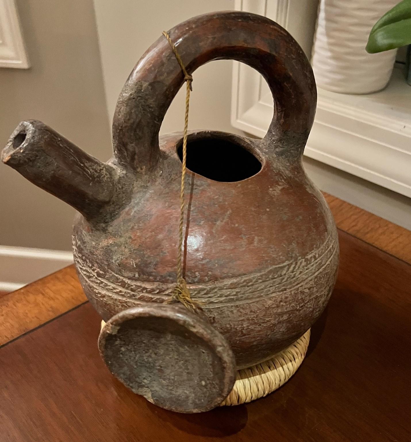 clay water jug with lid