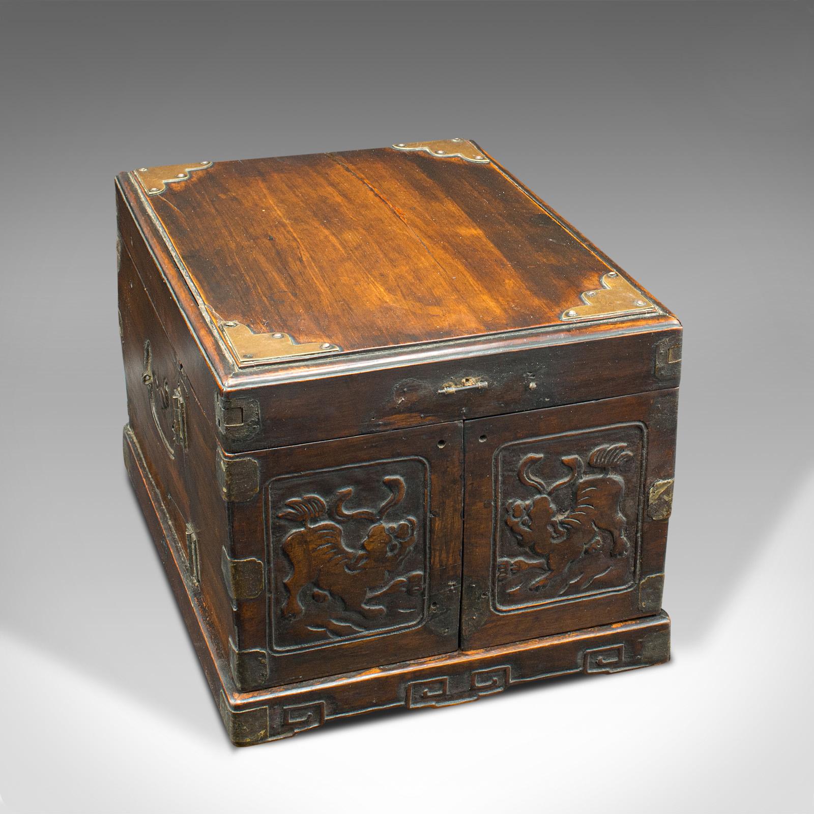 This is an antique cleric's swing-out case. A Chinese, hardwood travelling box, dating to the late Victorian period, circa 1890.

Charmingly provincial box, presented in original time-worn condition
Displays a desirable aged patina
