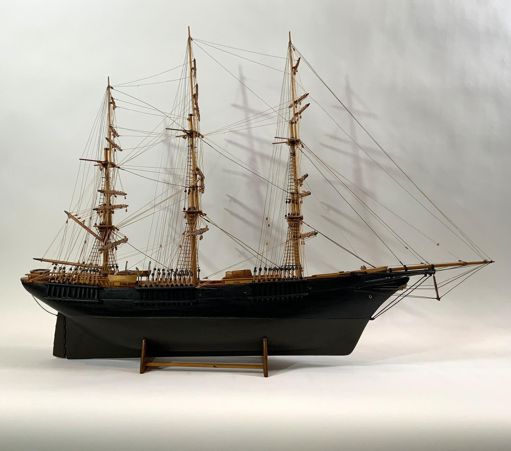 Early Twentieth Century ship model of an American windjammer. Awesome cabin and deck work with varnish finish. Fully rigged with all appropriate cords. Take a look at the quality wood working on the deck and cabins. The running rig cords run to pin