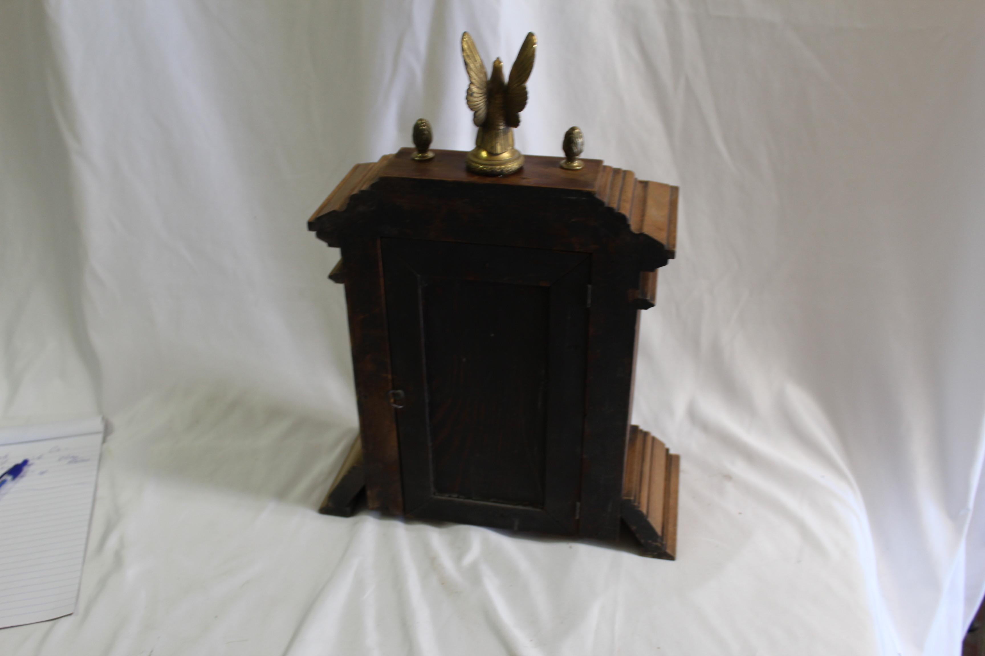 Wood Antique Clock Ansonia Oak Case w Eagle For Sale