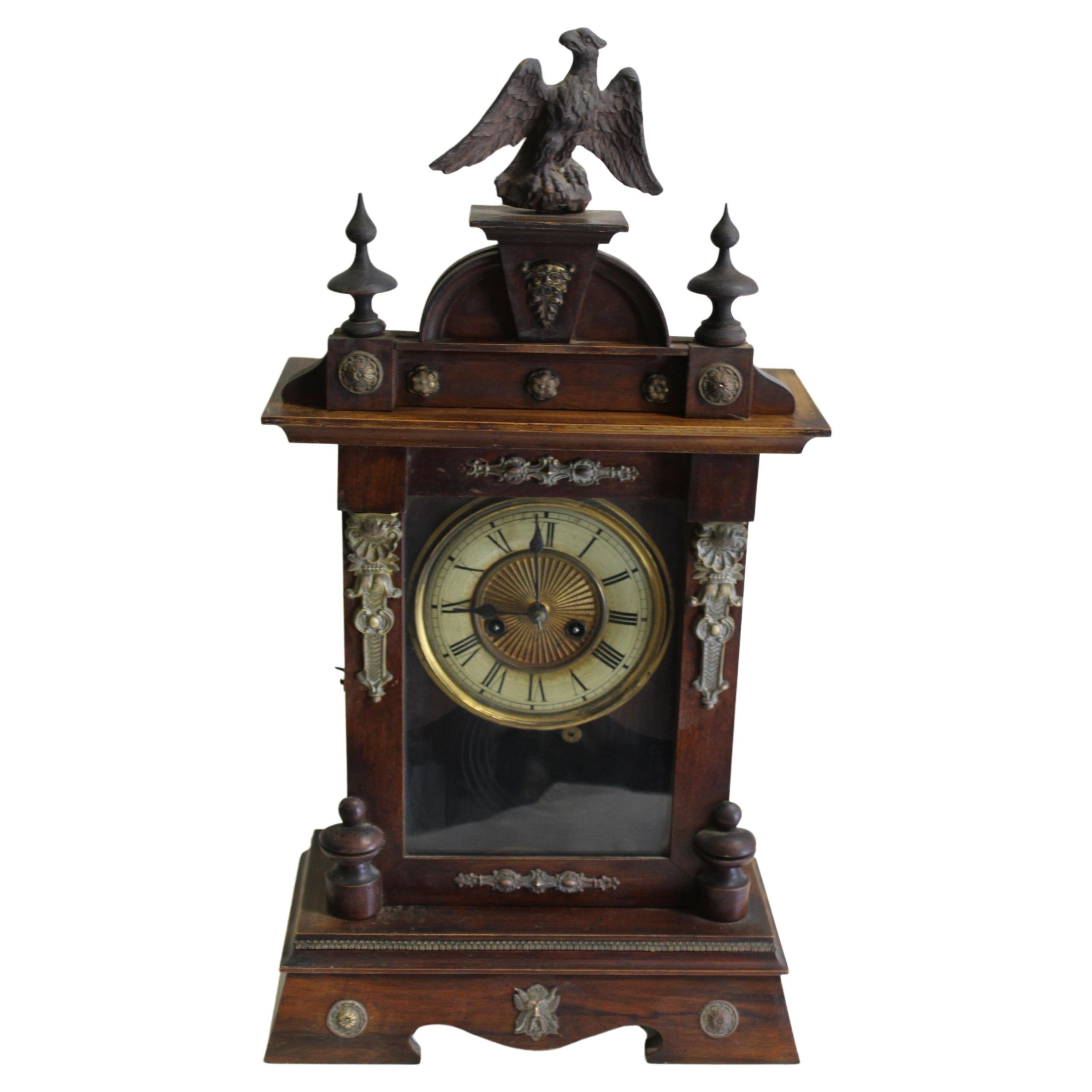 Antique Clock / Eagle top with brass appliques around  For Sale