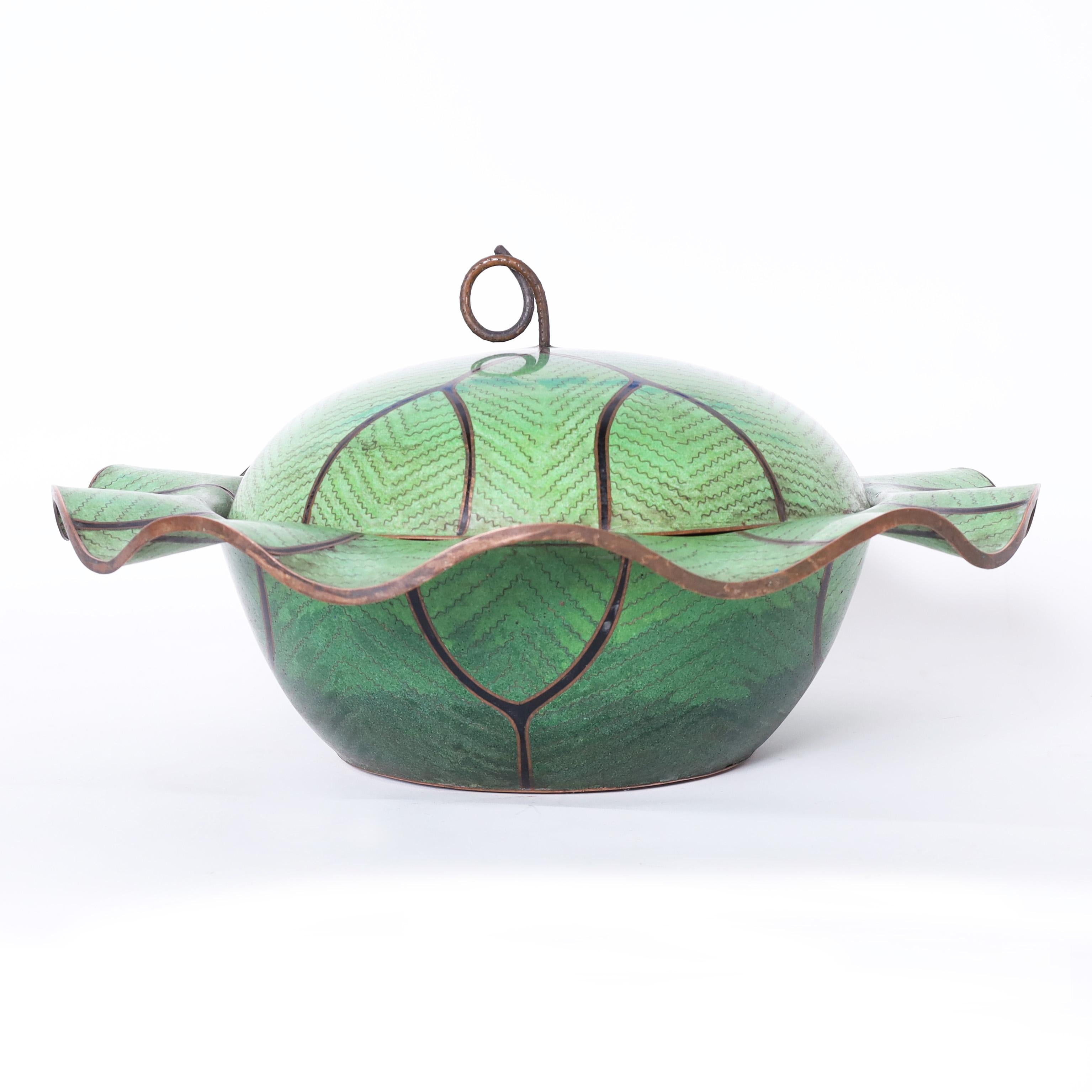 Standout Chinese lidded bowl crafted in copper and enamel or cloisonné in the leafy form of cabbage with a stem handle and blue interior.