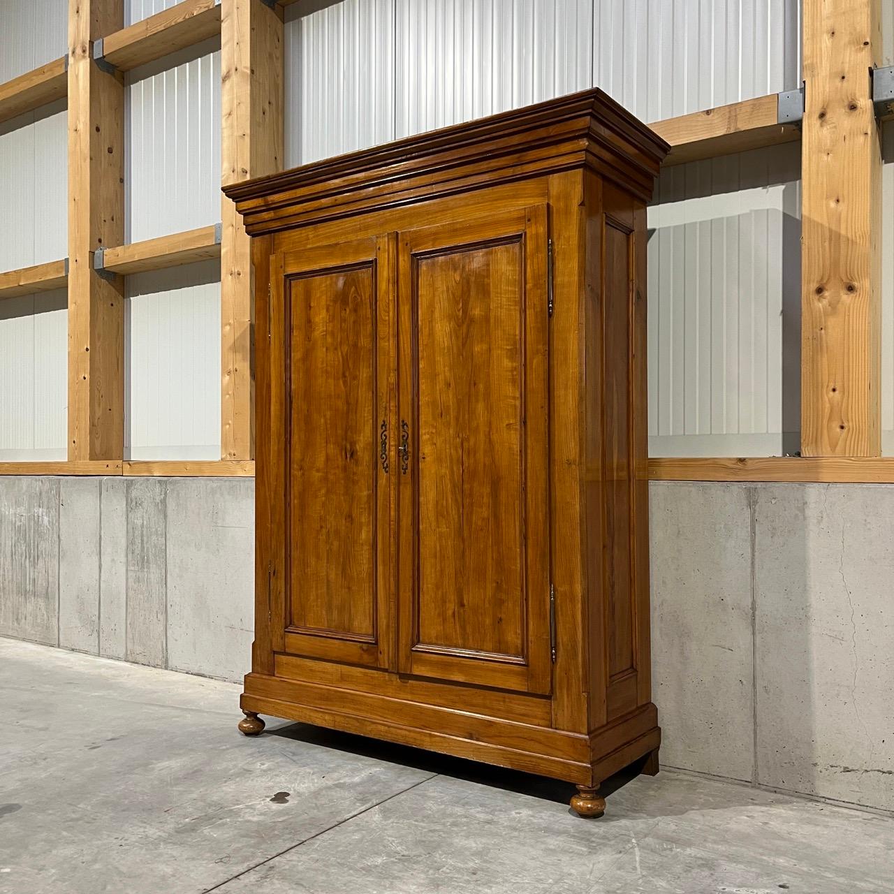 ✓ Classic and timeless
✓ Original patina
✓ Noble cherry solid wood

Dimensions: 
W: 163cm H: 215cm D: 59cm

Article: Antique closet
Item no.: 1018
Provenance: France, Louis Philippe around 1850
Material: cherry wood, solid wood
Color: gold, yellow,